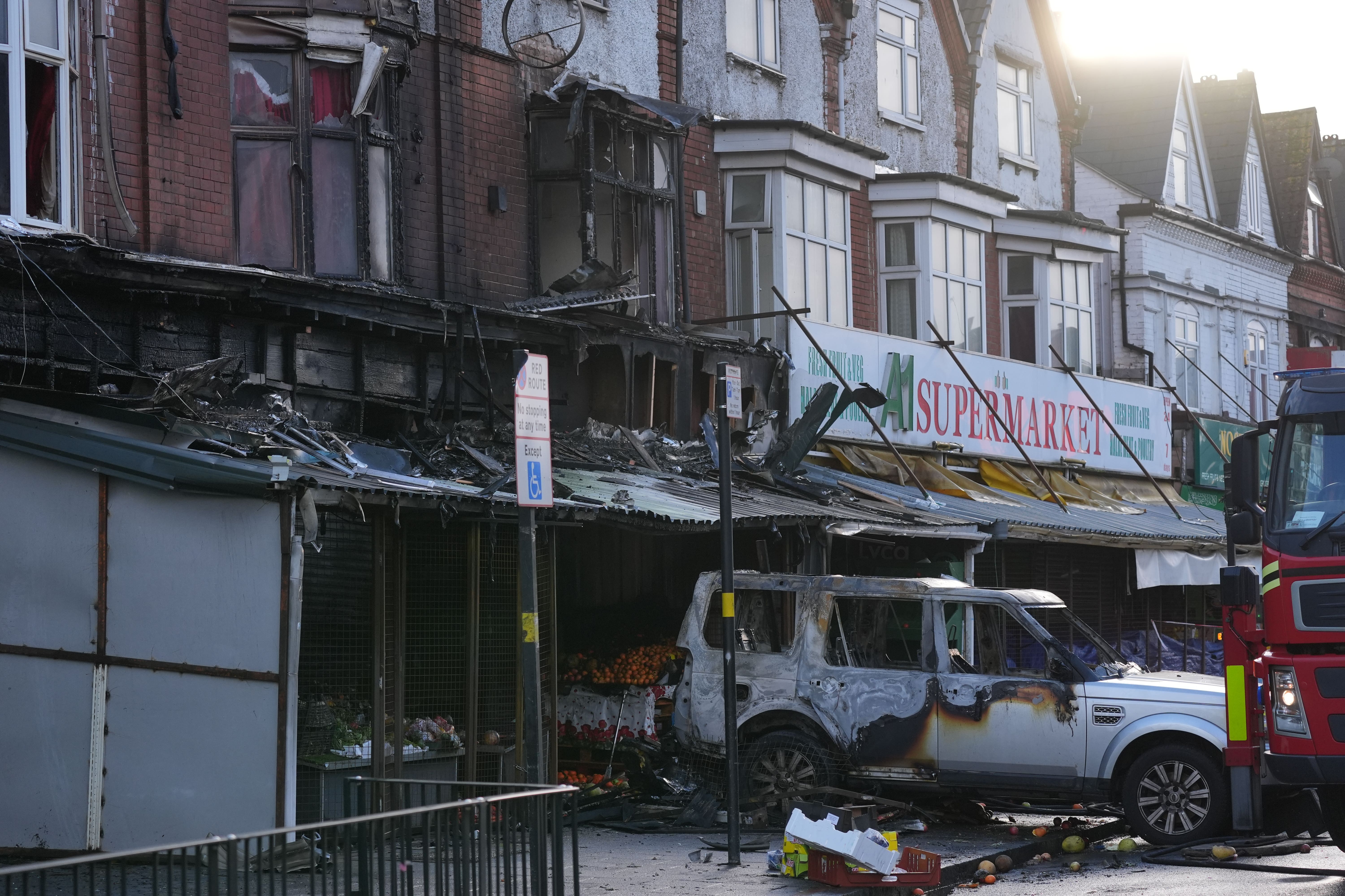 Emergency services at the scene of a fire at a mixed commercial and residential premises on Stratford Road in Sparkhill, Birmingham (Jacob King/PA)