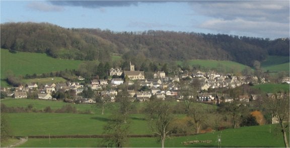 View of the Gloucestershire village of Uley - and the hill, on which the Late Iron Age shrine (and subsequently the Romano-British temple) used to stand.