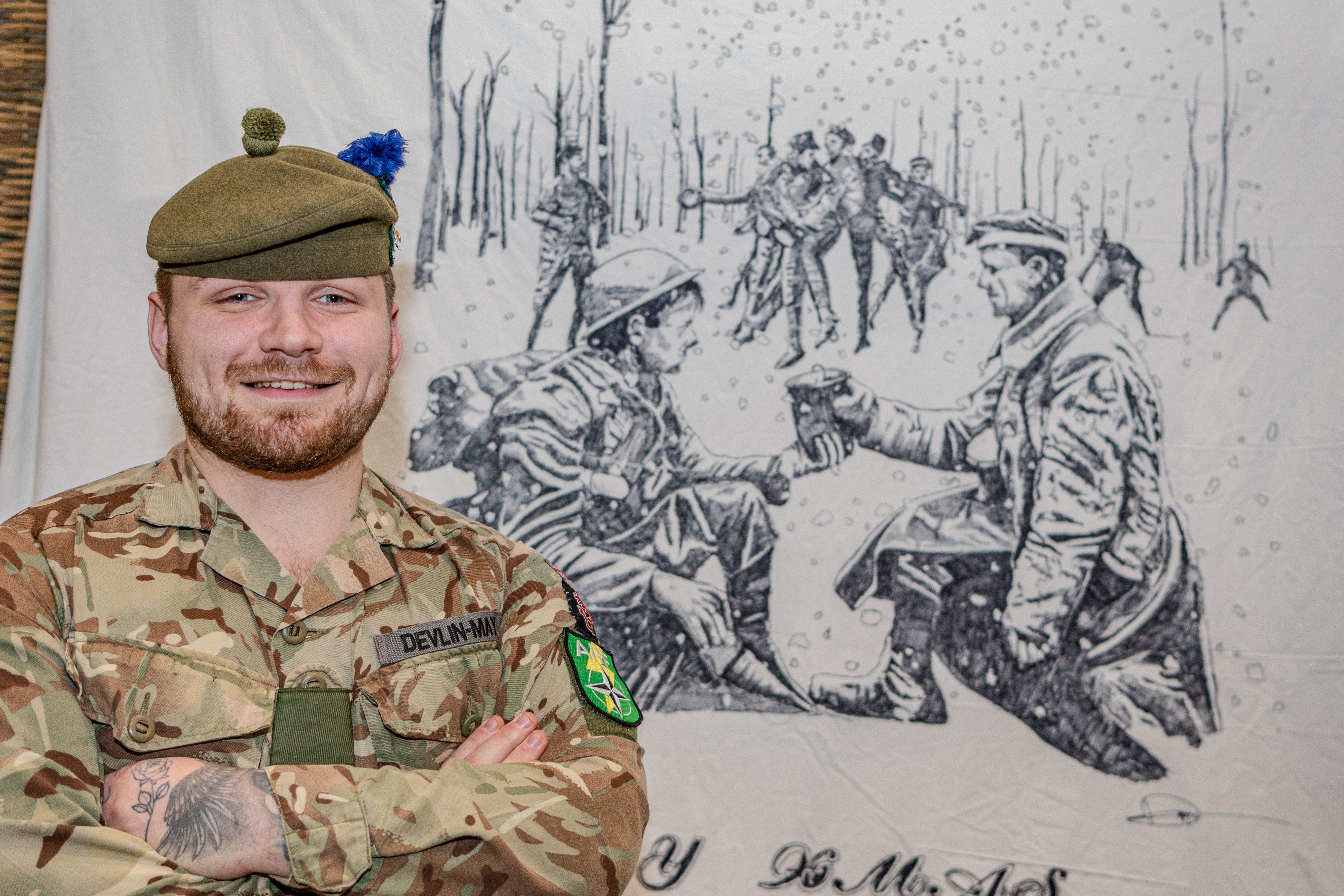 Corporal Lewis Devlin-May with his winning Christmas blanket (4Scots/Grayling/PA)