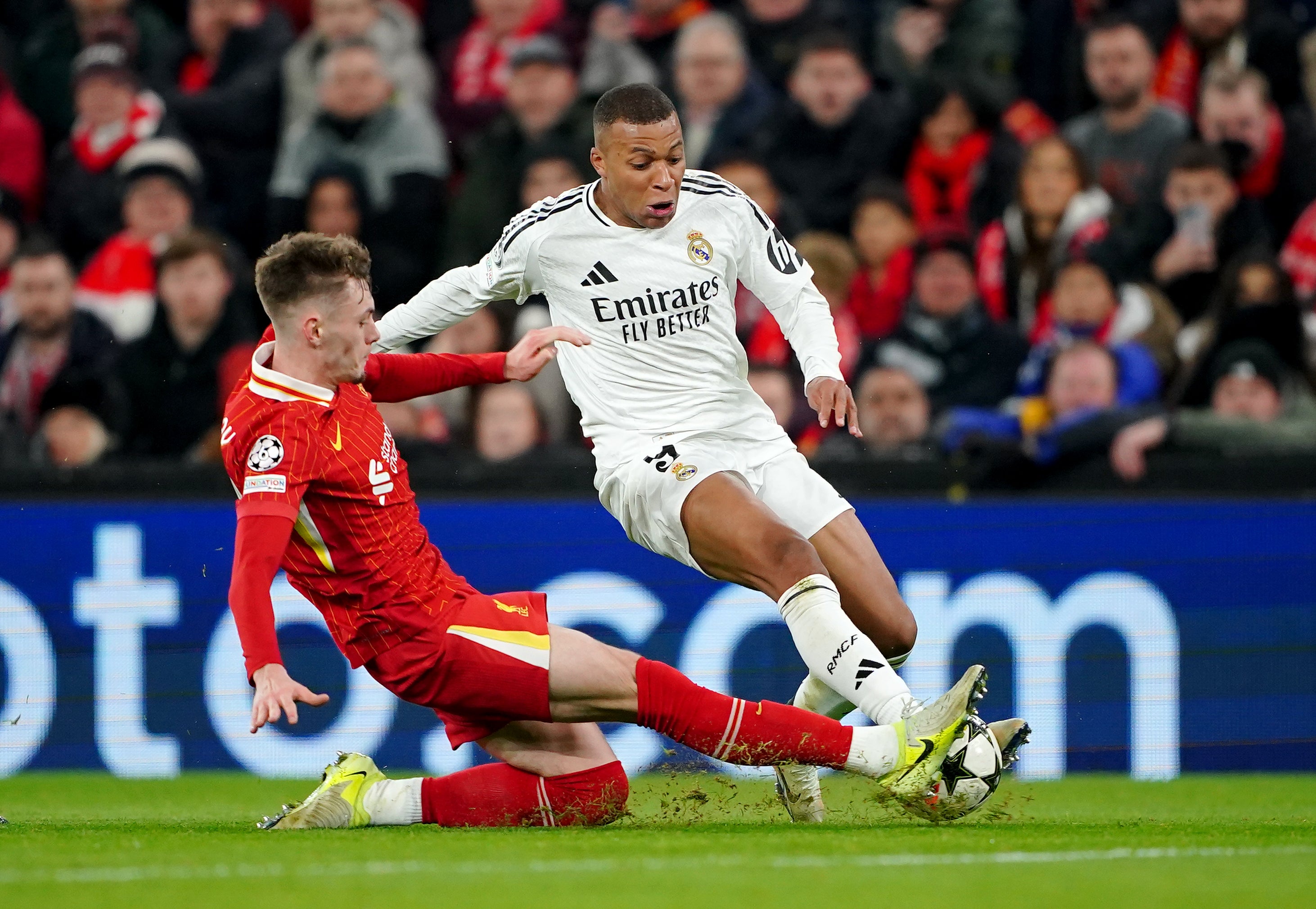 Liverpool’s Conor Bradley brilliantly tackles Real Madrid’s Kylian Mbappe