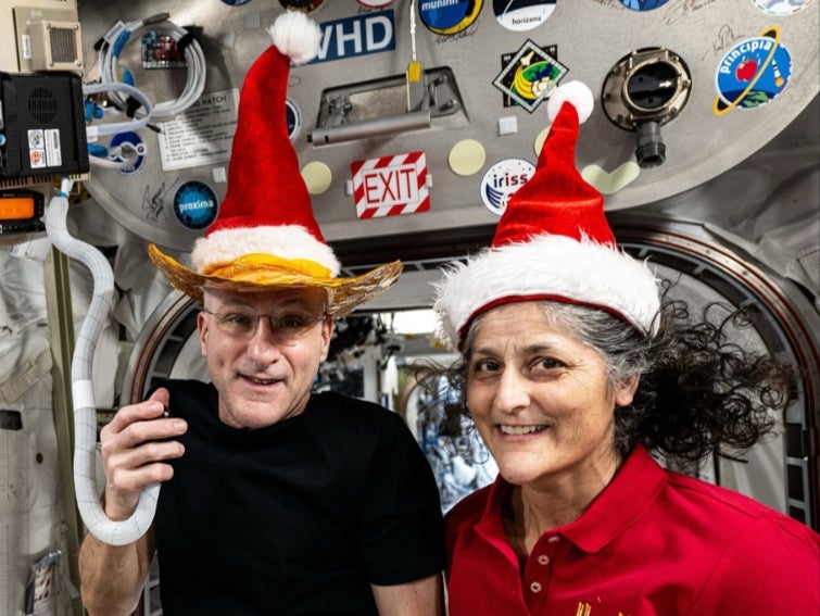 NASA astronauts Sunita “Suni” Williams and Barry “Butch” Wilmore embraced the holiday spirit with some festive gear aboard the ISS