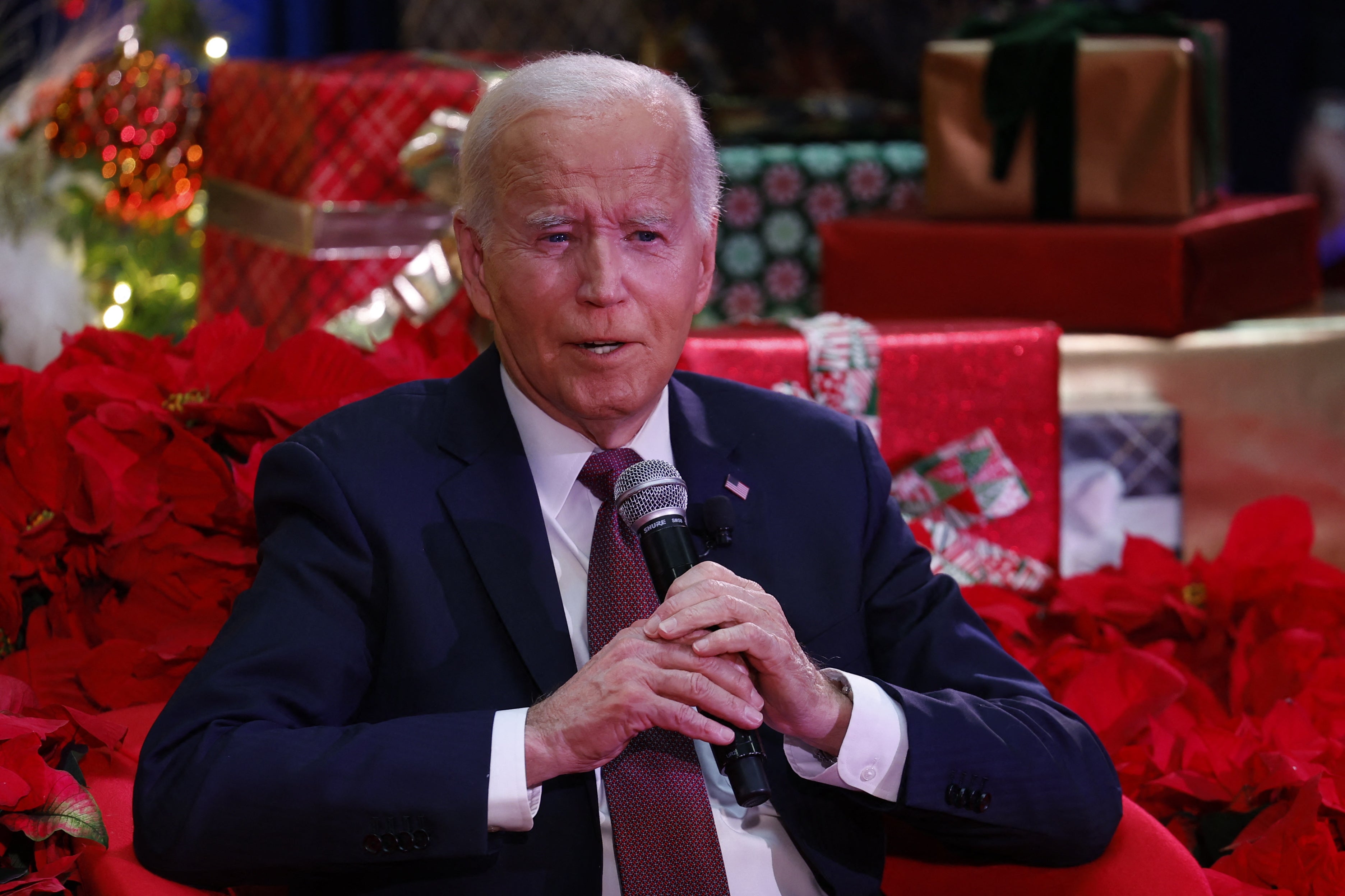 US President Joe Biden speaks during a holiday visit to patients and families at Children's National Hospital in Washington, DC, on December 20, 2024. Biden signed 50 bills into law on Christmas Eve