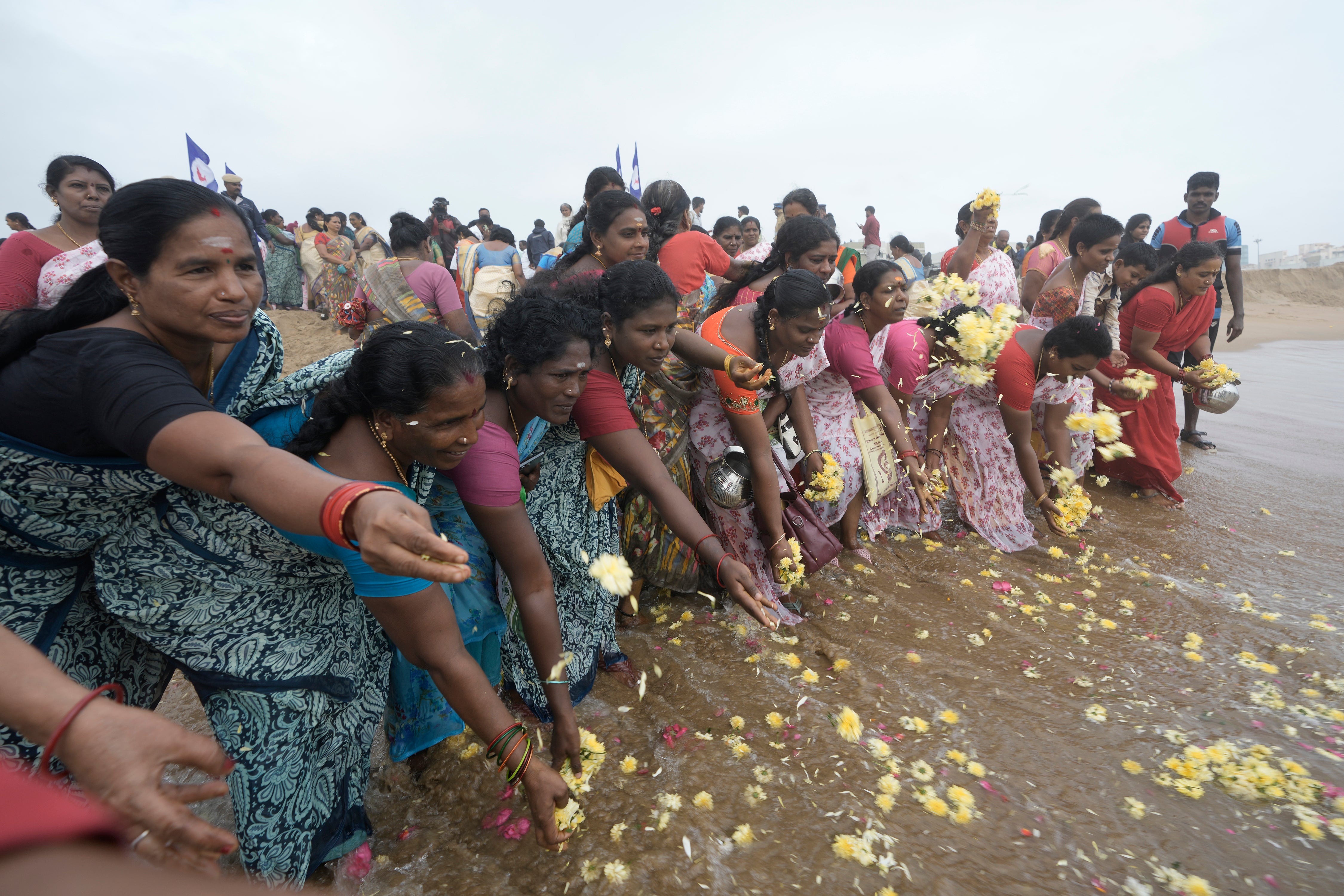 India women offer tributes in memory of the victims of the 2004 tsunami on the 20th anniversary of the tragedy