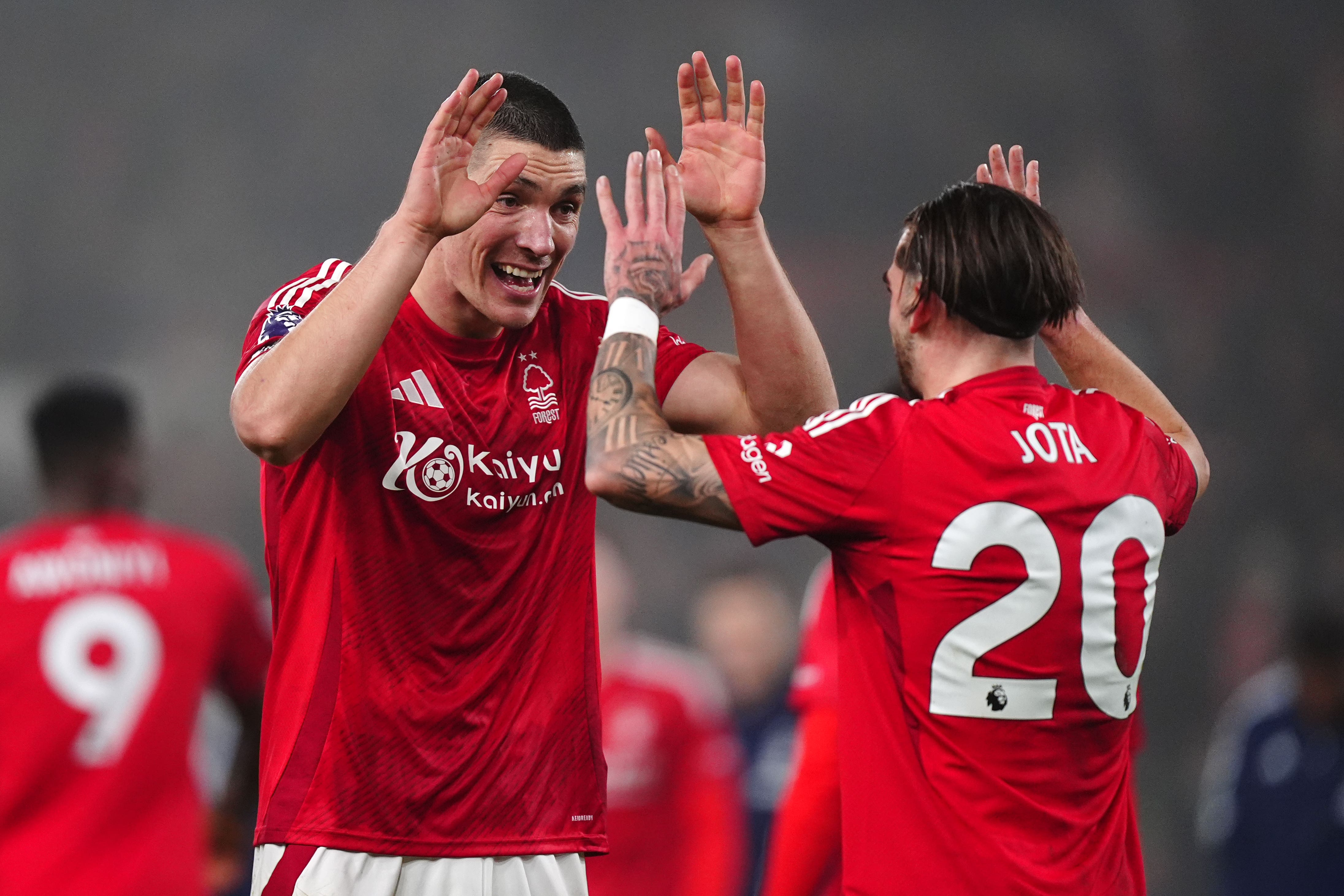 Nottingham Forest’s Jota Silva and Nikola Milenkovic celebrate their win over Tottenham (Mike Egerton/PA).