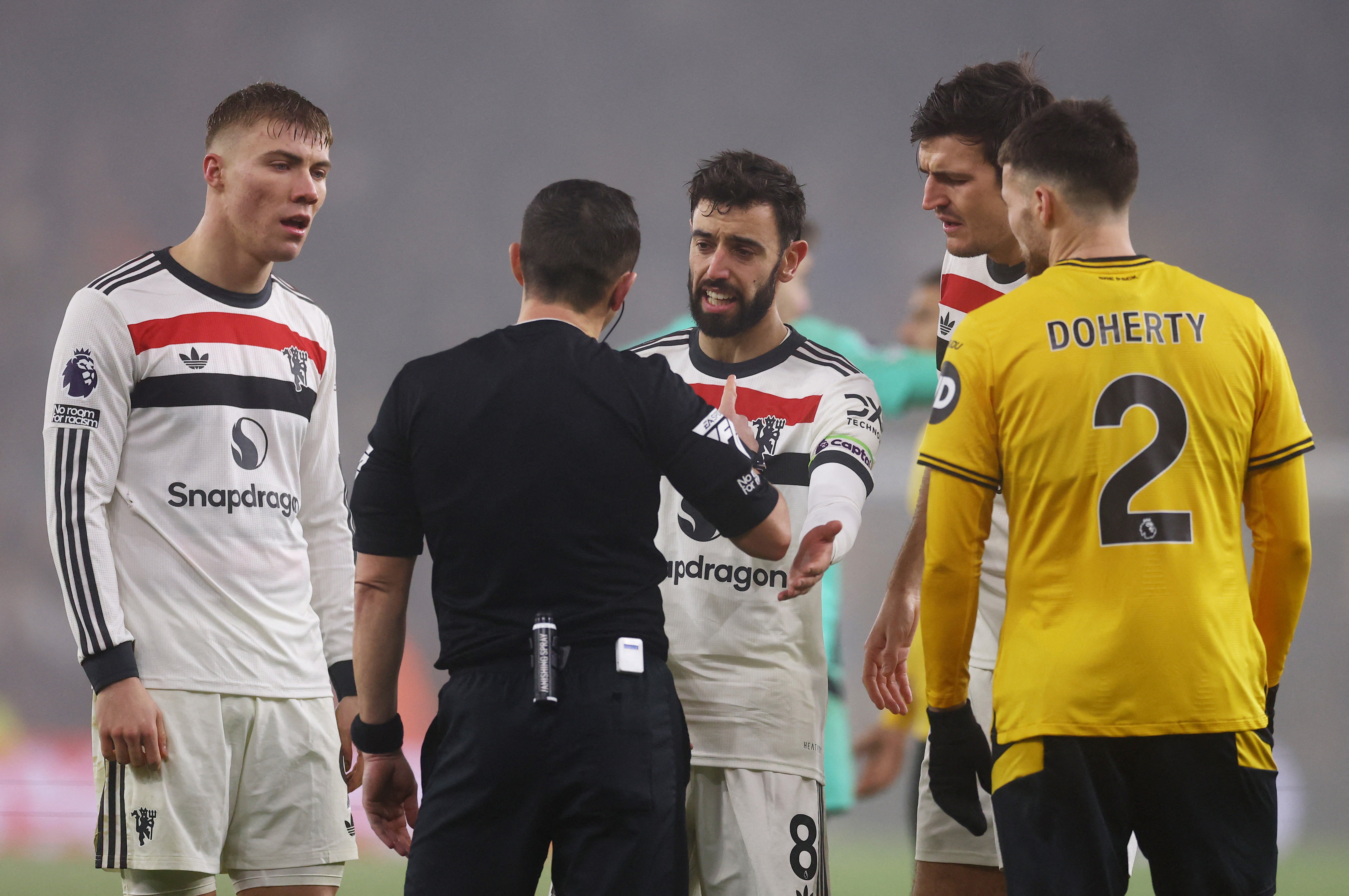 Bruno Fernandes remonstrates with referee Tony Harrington