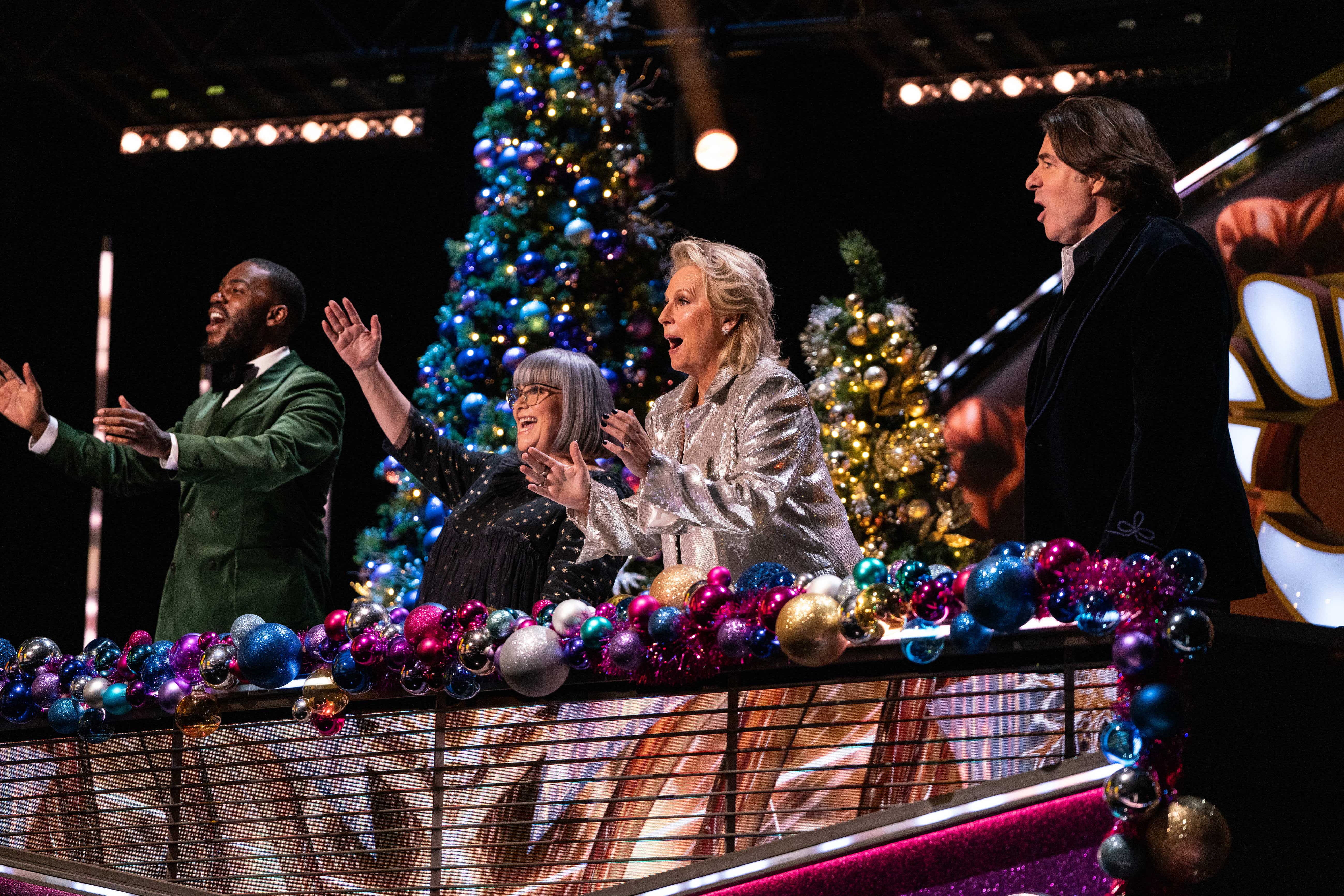 <p>The Masked Singer judge deceives panellists with Christmas special performance (ITV/PA)</p>