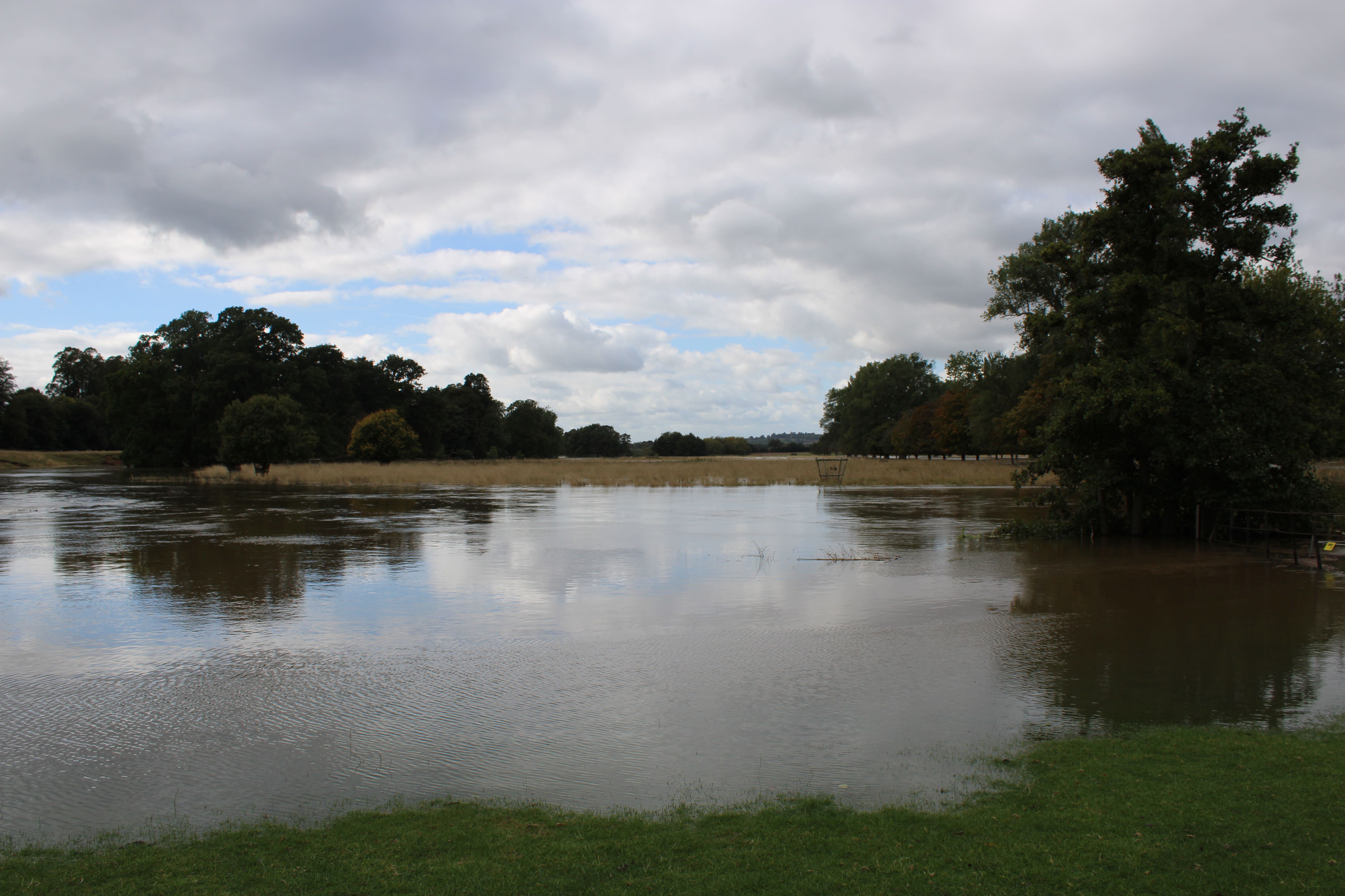 Floodwater covers parkland at Charlecote Manor in September (Camille Francois/National Trust/PA)