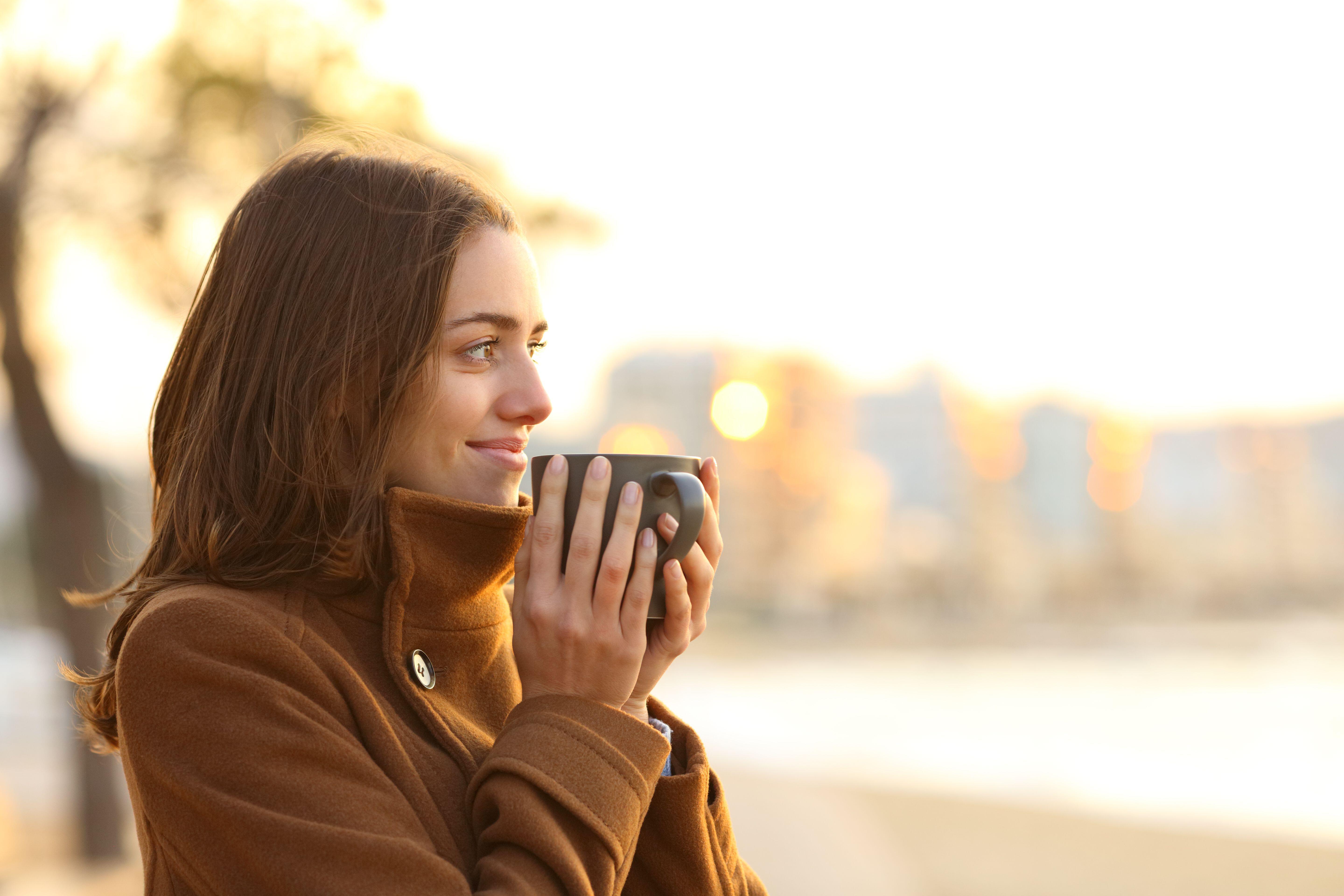 A woman hacing her morning coffee