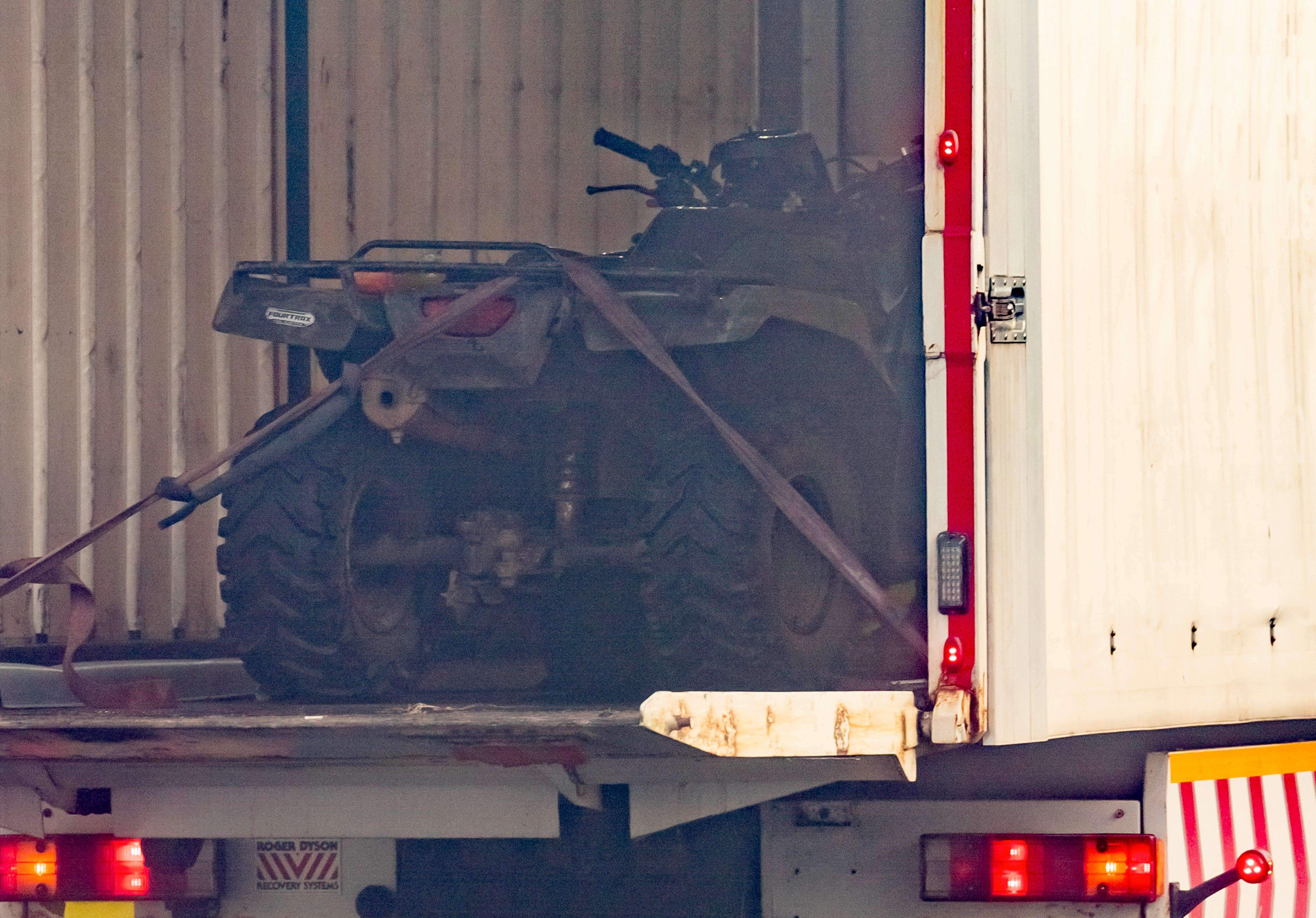 The Honda quad bike being removed from the scene