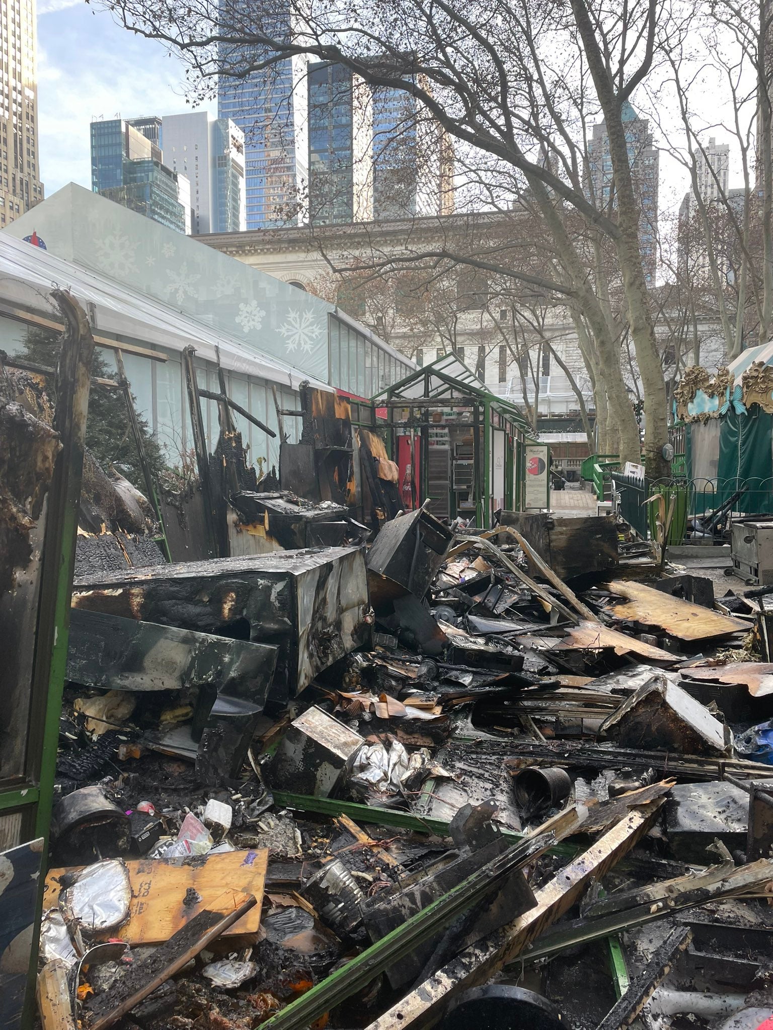 Photos shared by the FDNY show the aftermath of the destruction caused by the fire in Bryant Park