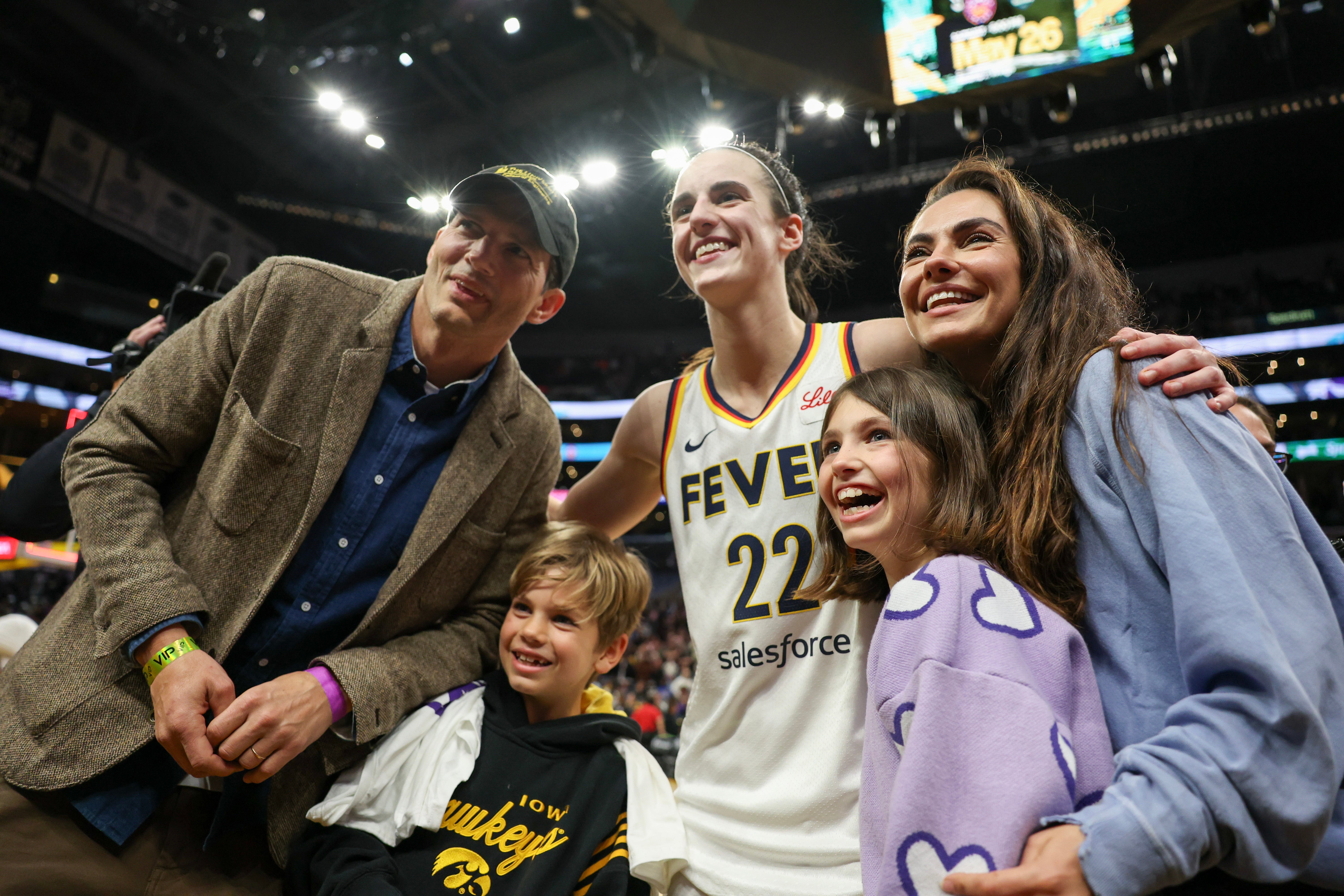 Mila Kunis, Ashton Kutcher, and their two children met Caitlin Clark at a WNBA game in May