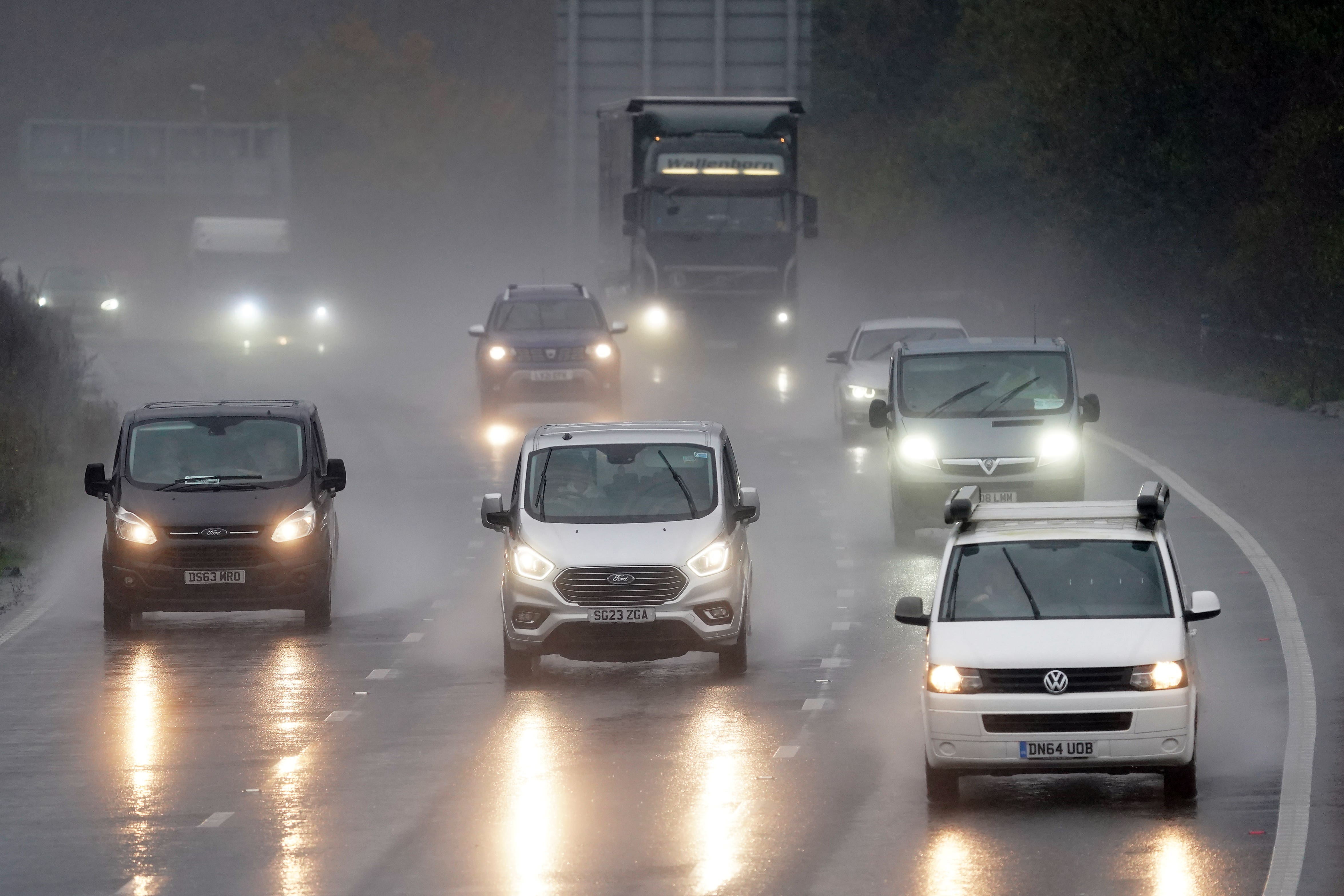 Heavy rain is expected to result in difficult driving conditions in the build-up to New Year (Gareth Fuller/PA)