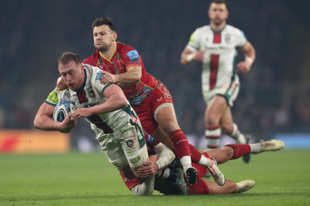 <p>Tommy Reffell of Leicester Tigers is tackled by Danny Care and Nick David </p>