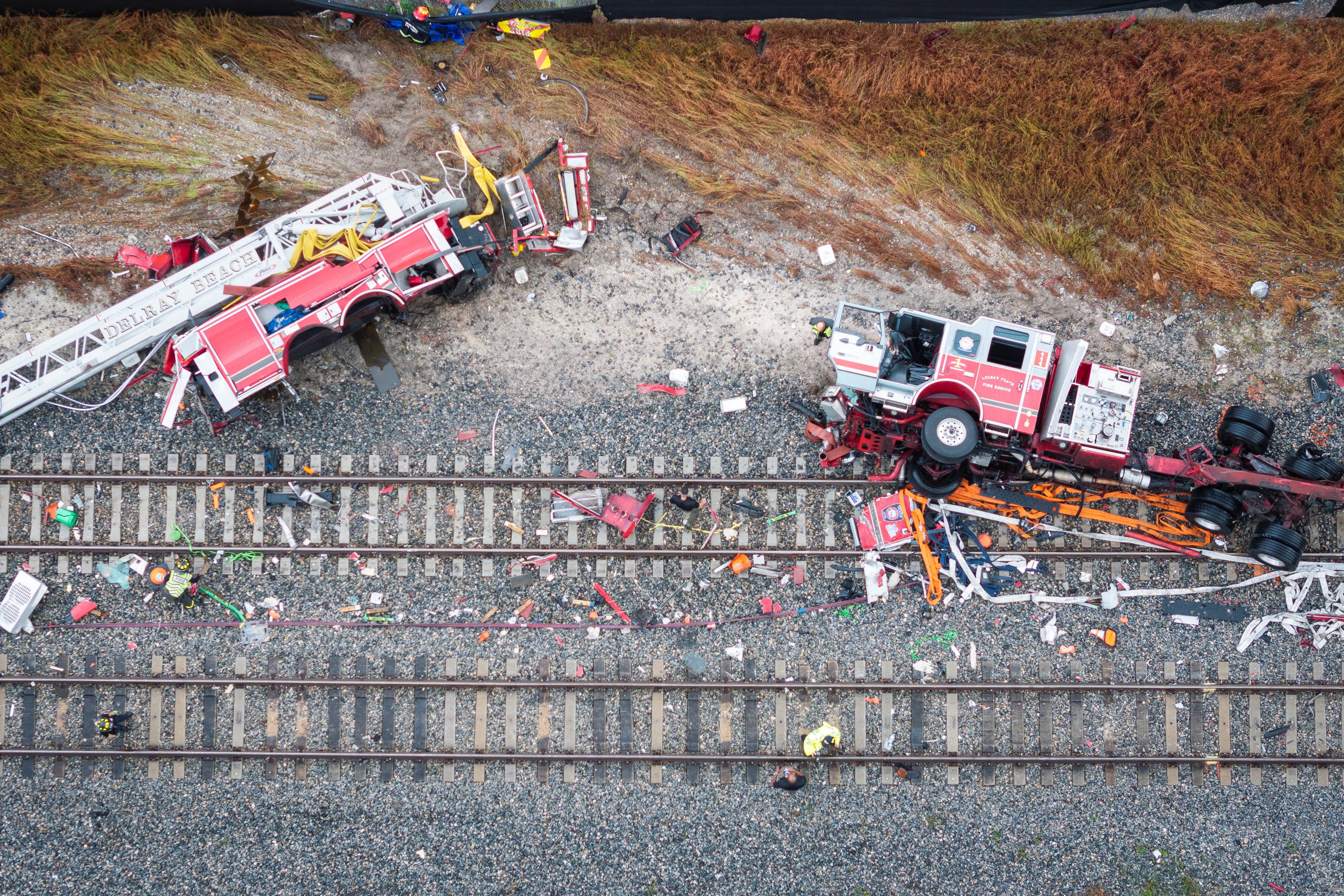 A drone view shows the wreckage scene after a Brightline passenger train collided with a fire truck on railtracks in Delray Beach, Florida, U.S. December 28, 2024