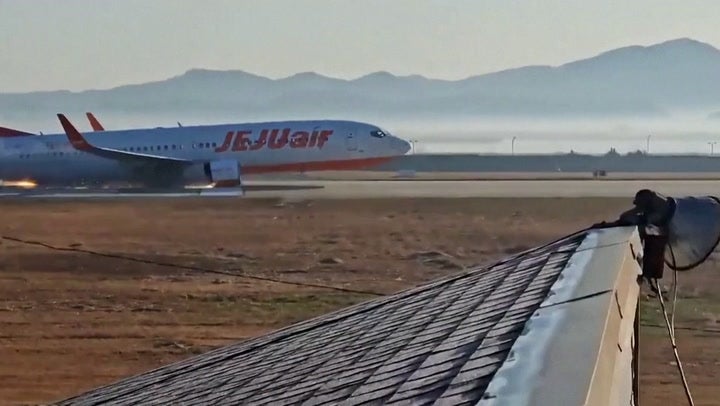 A still taken from a video shows the seconds before Jeju Air Flight 7C2216 collided into a brick wall, killing 179 passengers