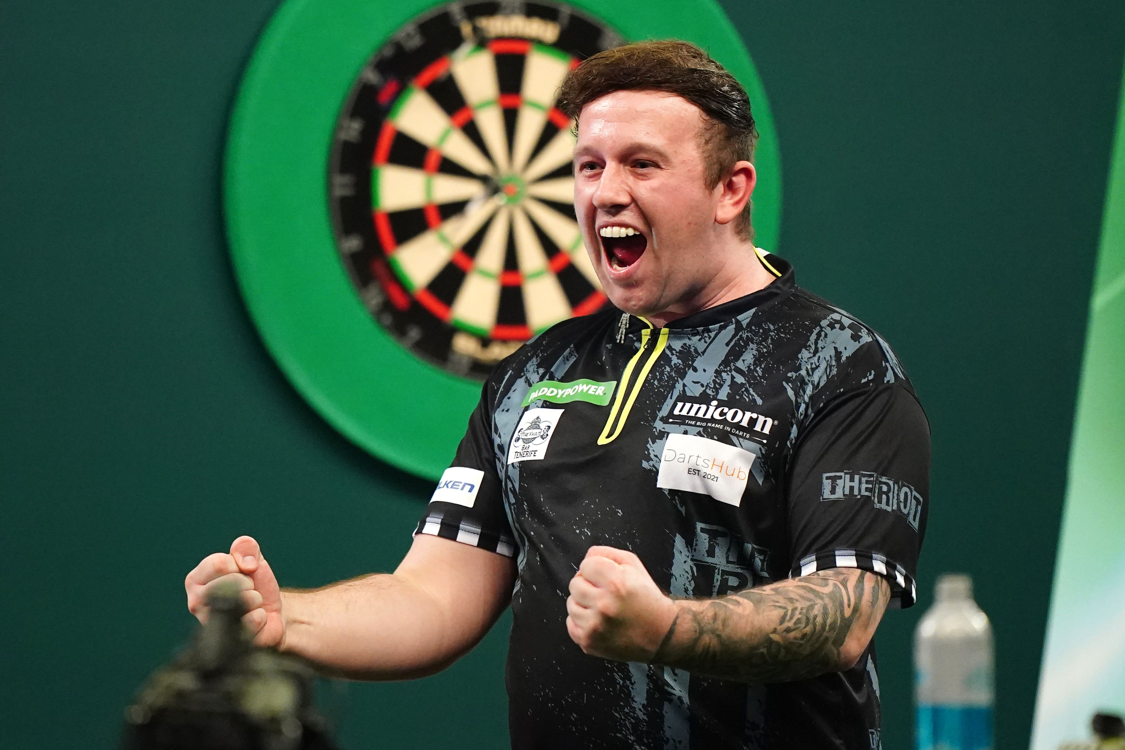 Callan Rydz, who has yet to drop a set at the World Championship, celebrates his win over Dimitri Van den Bergh (Zac Goodwin/PA)