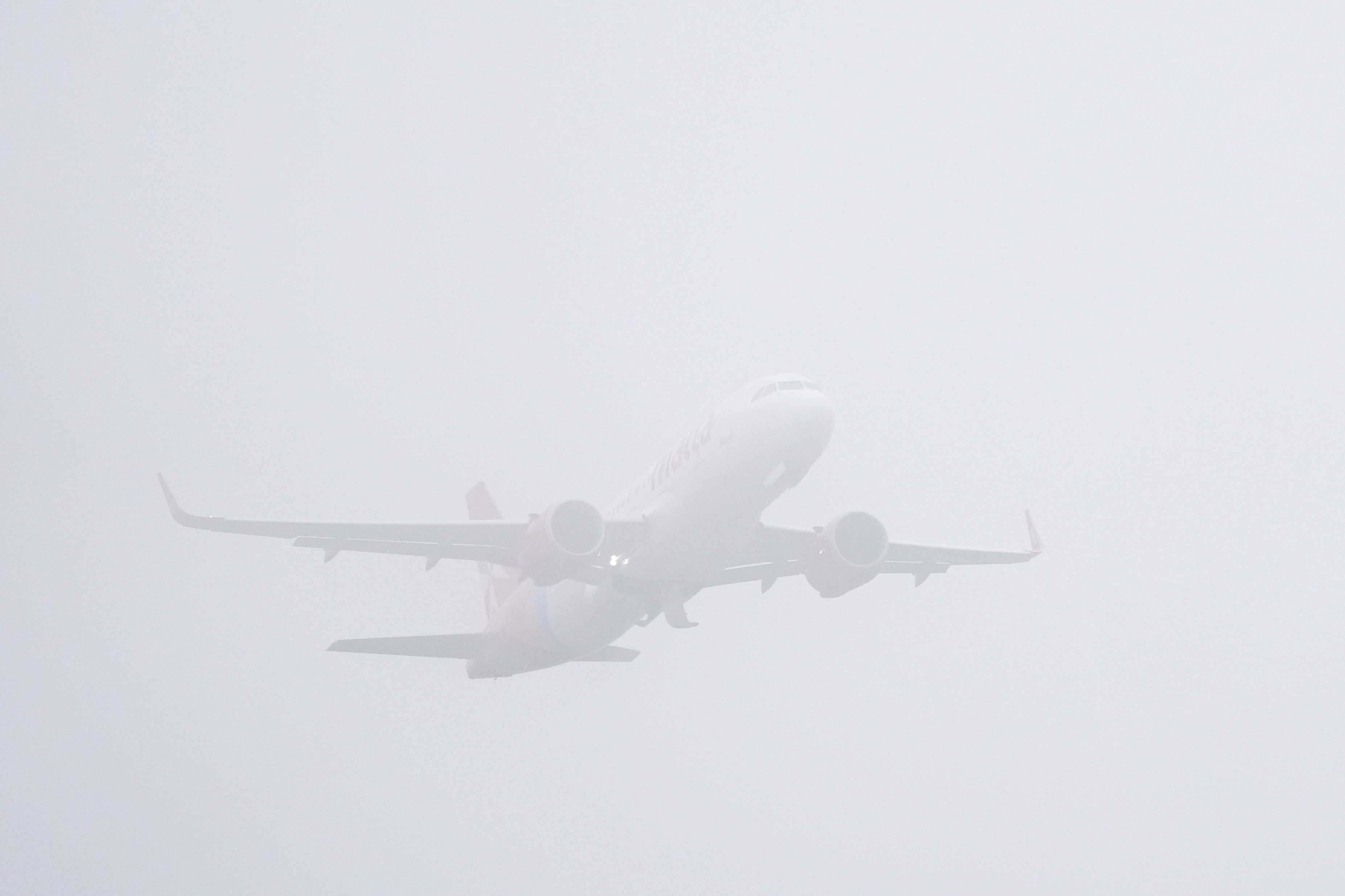 Fog has impacted flights at Gatwick Airport on Sunday, the airport’s busiest day of the holiday period (PA)