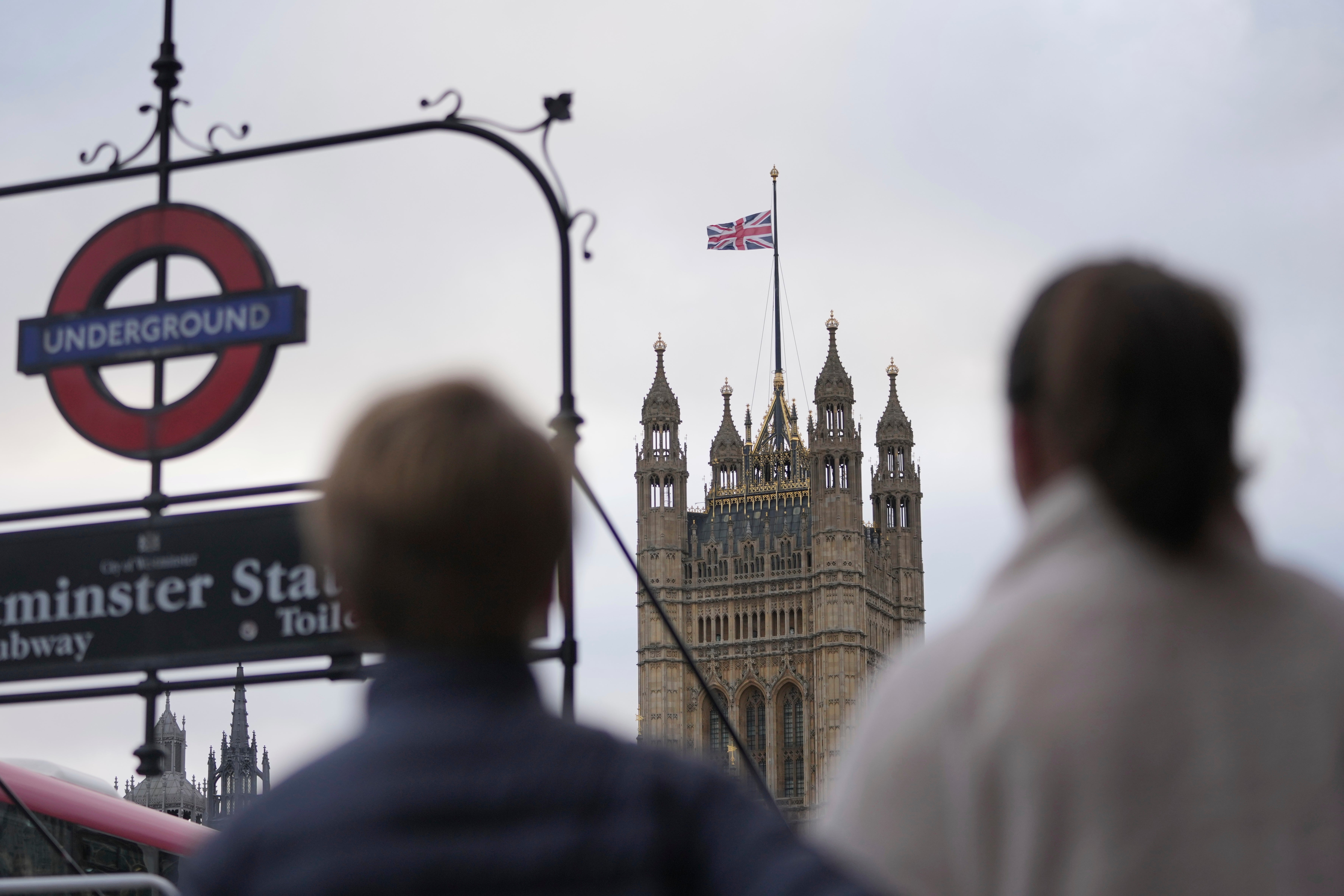 A flag flies at half-mast for the late former U.S. President Jimmy Carter at the Houses of Parliament in London on Monday