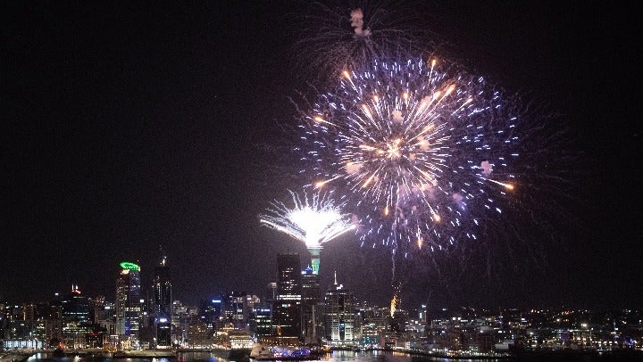 Fireworks are seen exploding from the Auckland’s Waitemata Harbour and Sky Tower during the Auckland New Year's Eve celebrations on January 01, 2020 in Auckland, New Zealand