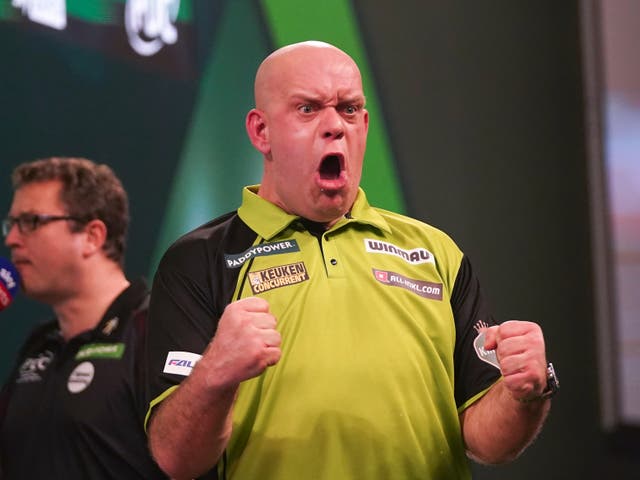 <p>Michael van Gerwen celebrates after winning against Jeffrey De Graaf</p>