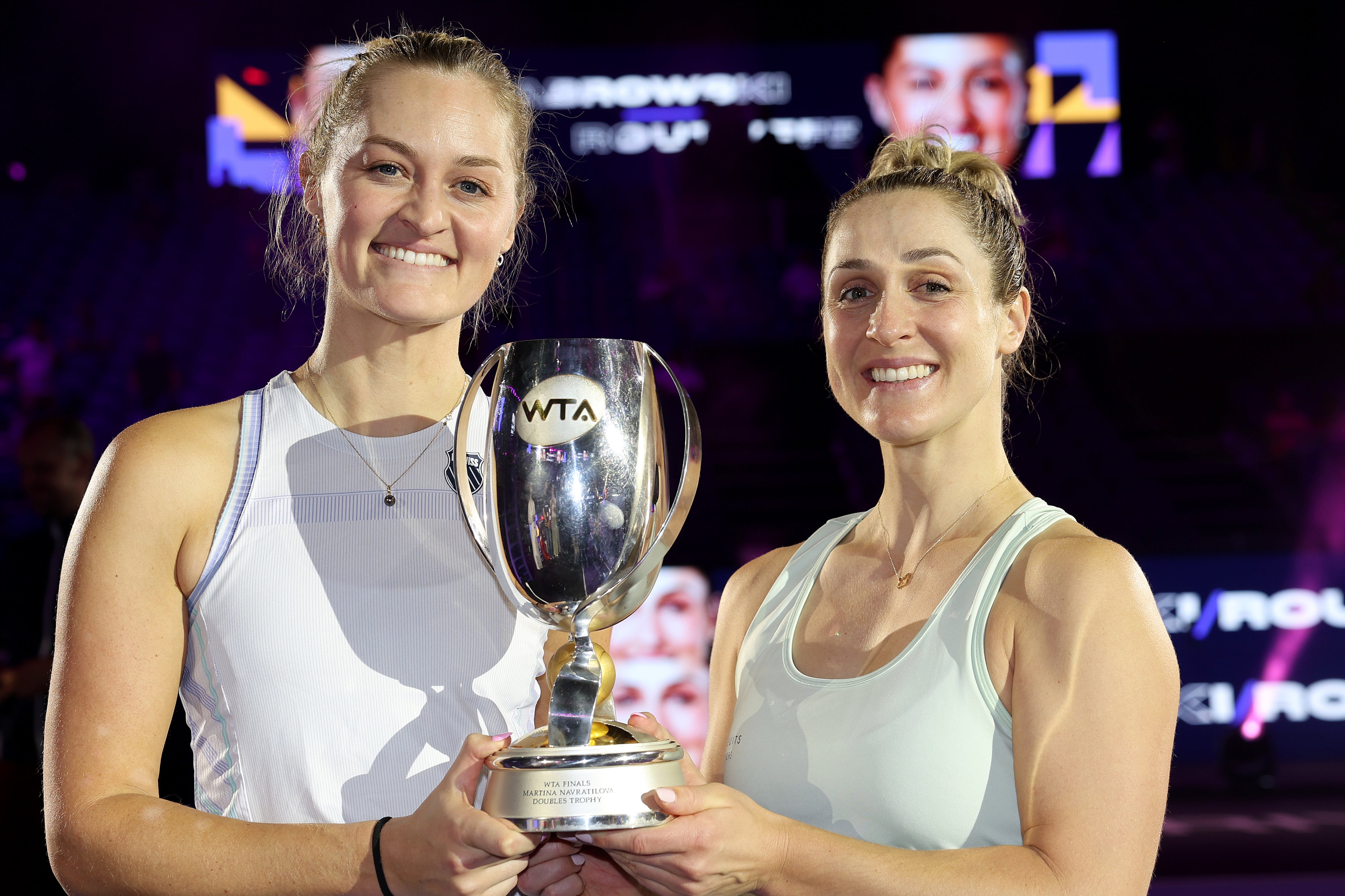 Gabriela Dabrowski (right) with partner Erin Routliffe after winning the WTA Finals