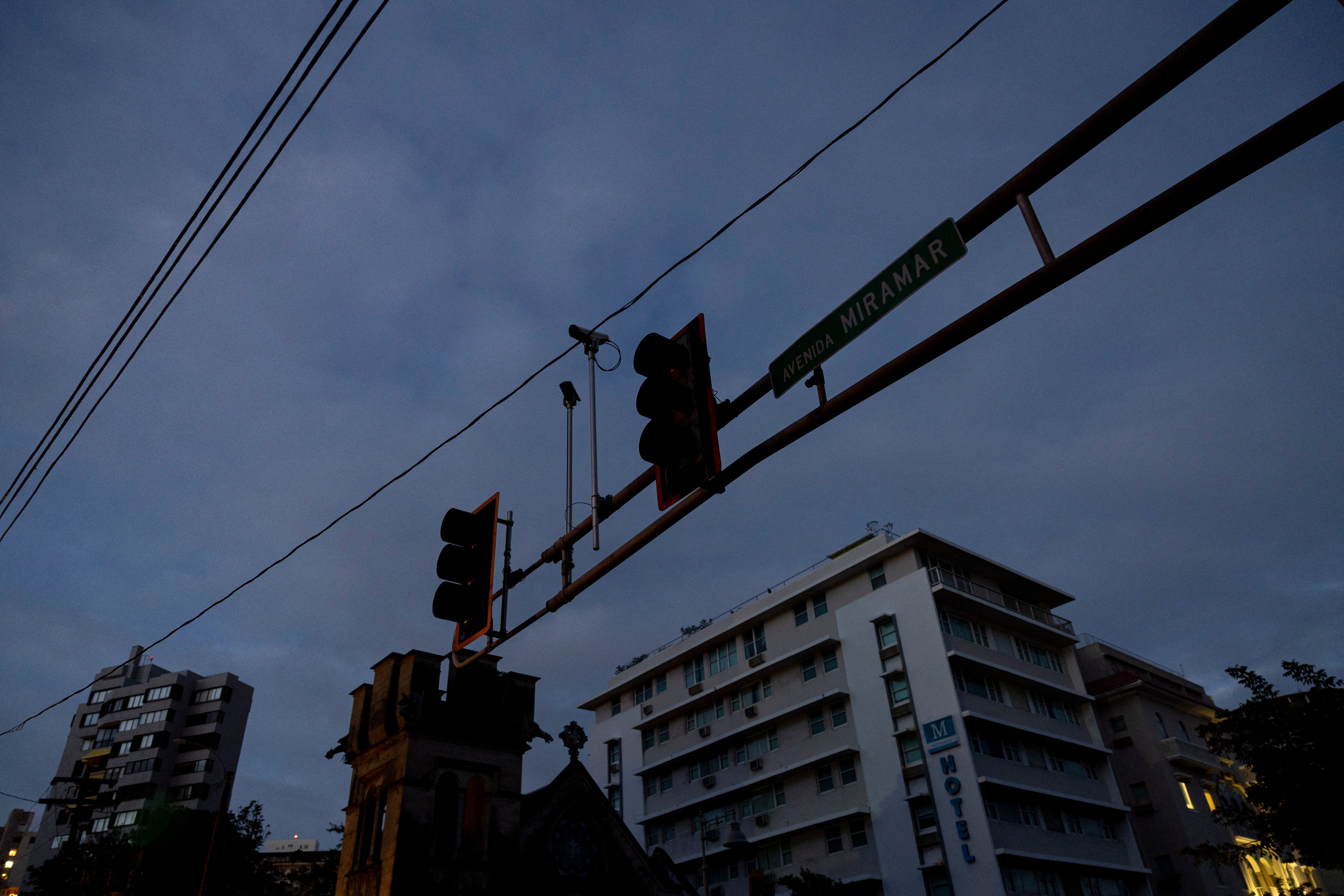 An intersection without stop lights is seen in the dark in San Juan, Puerto Rico after a major power outage hit the island on December 31