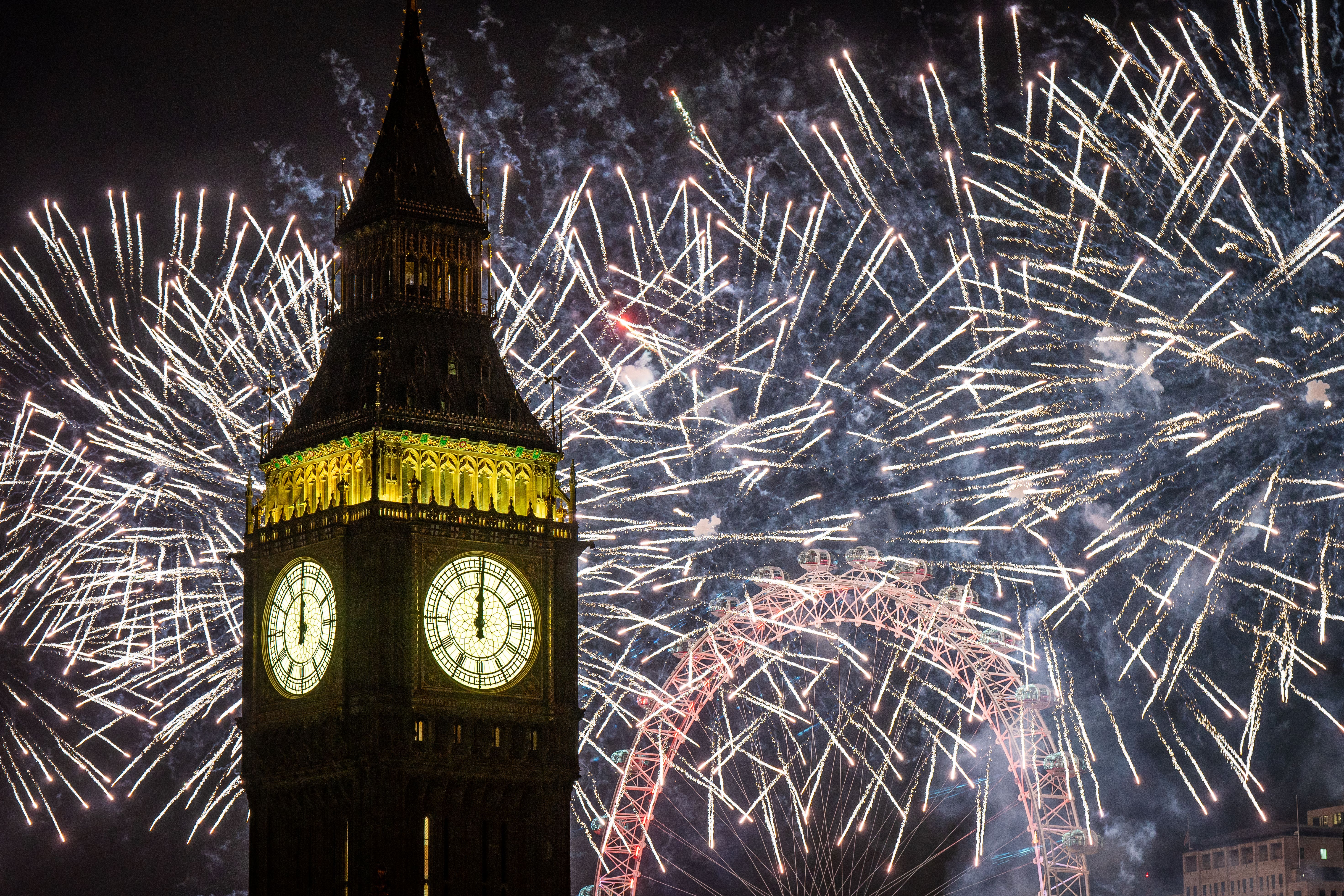 Fireworks light up the sky over the London Eye in central London during the 2024 New Year celebrations (Aaron Chown/PA)