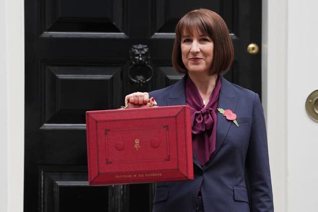 <p>Chancellor of the Exchequer Rachel Reeves poses outside 11 Downing Street (Lucy North/PA)</p>