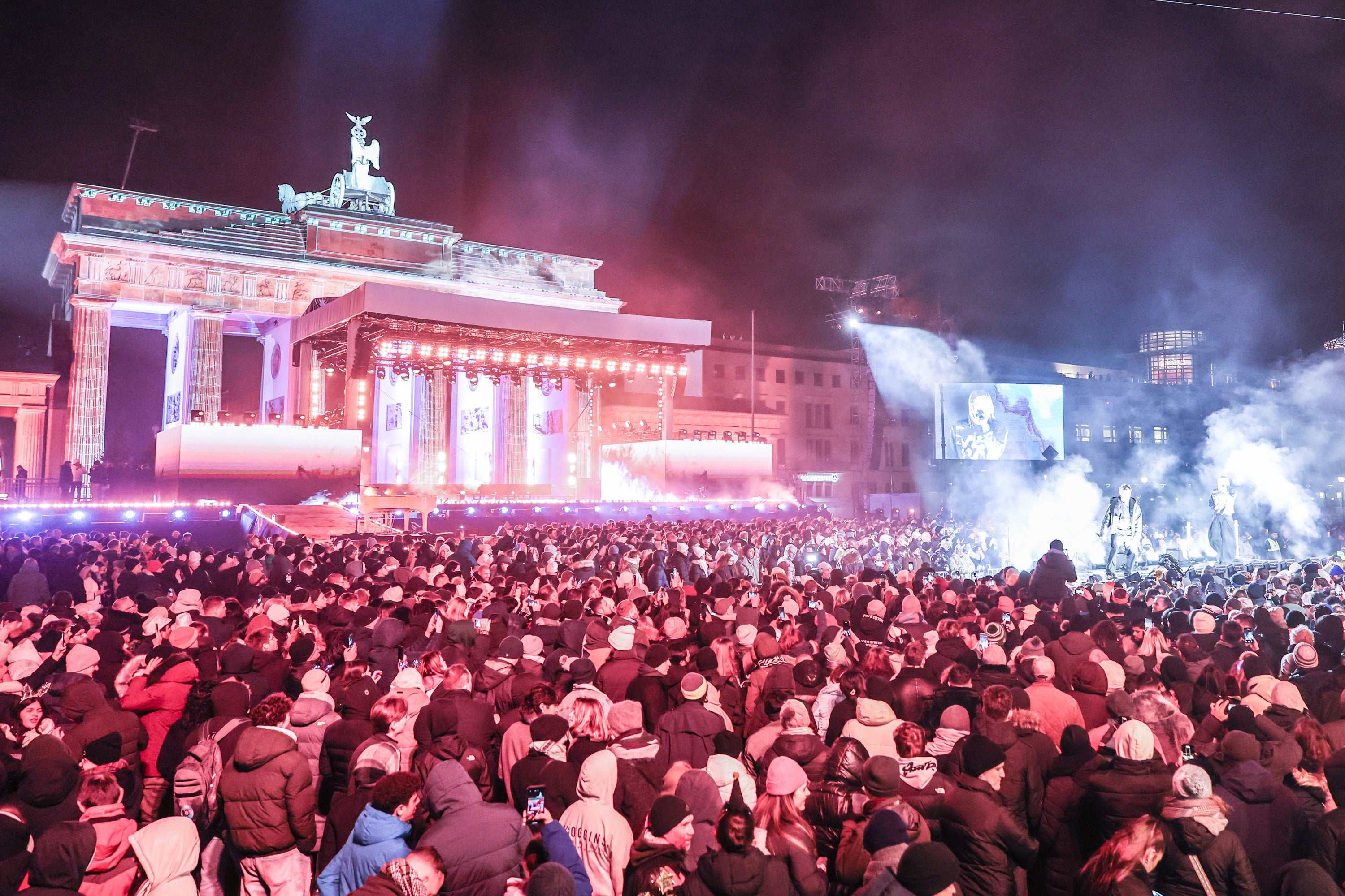 Revellers gather in front of Brandenburg Gate for the New Year's Eve celebrations