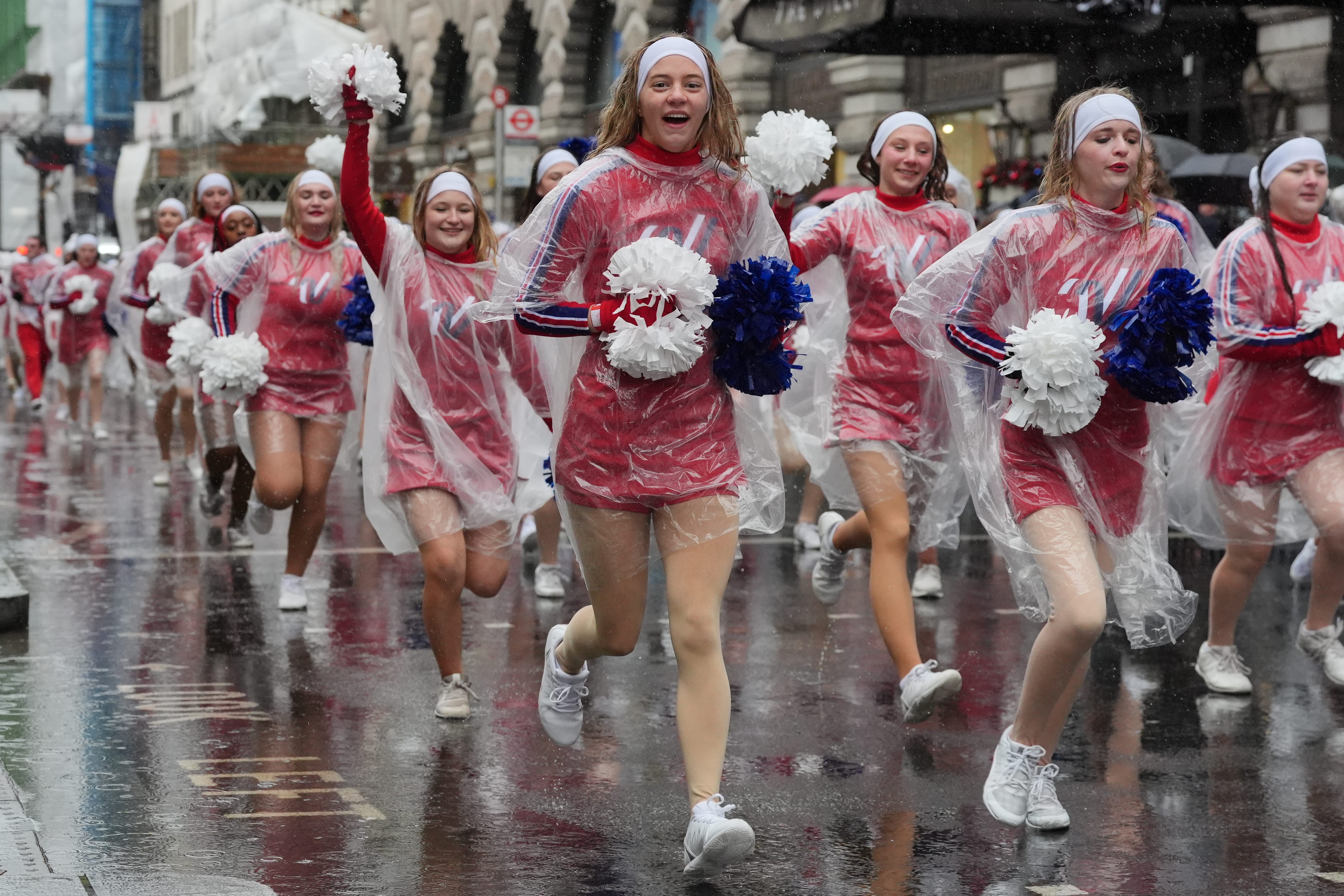 Supporters turned out to the New Year’s Day parade in London despite the wind (Jonathan Brady/PA)