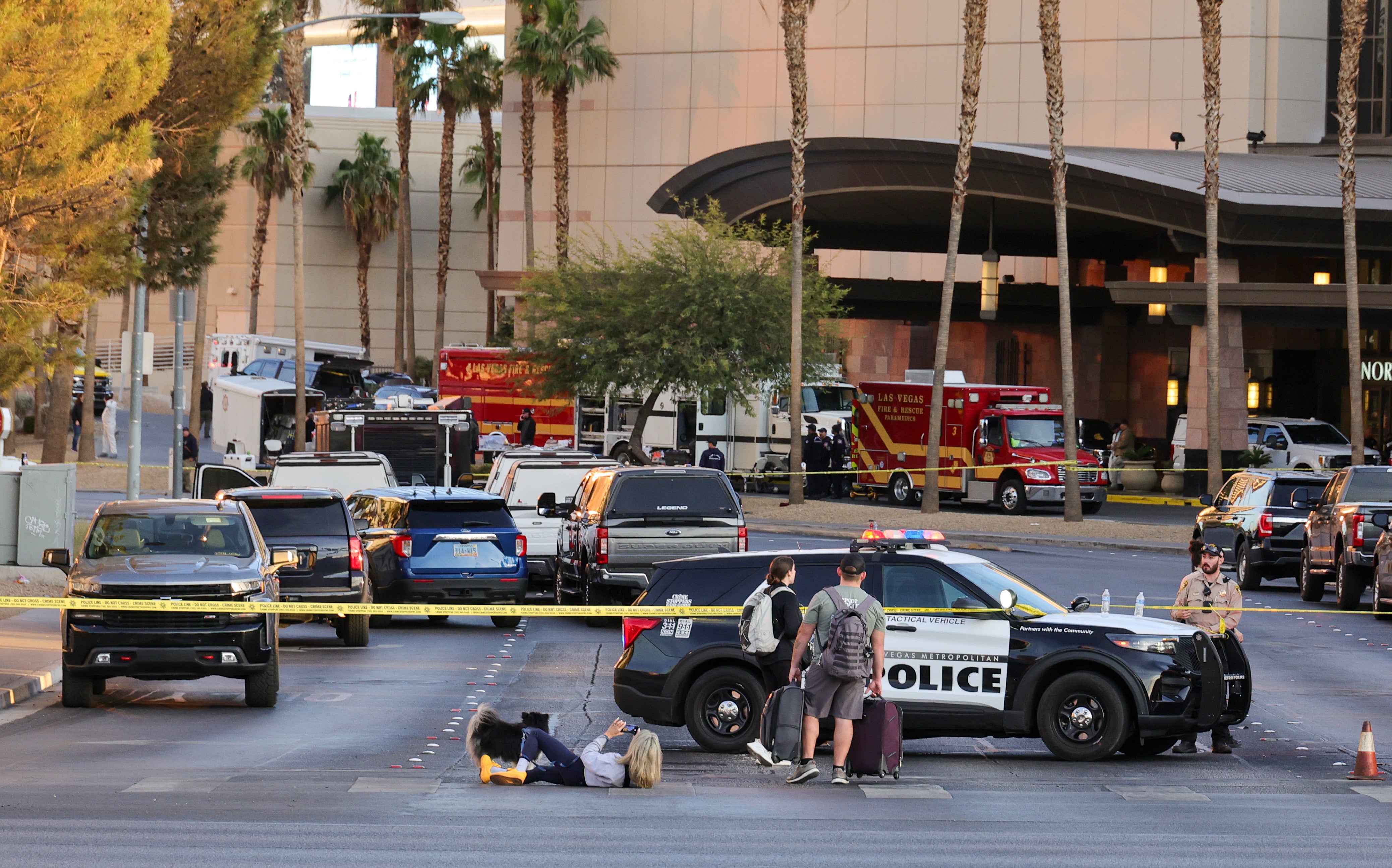 Las Vegas Metropolitan Police Department swarm the area around the Trump International Hotel