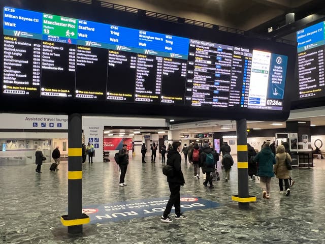 <p>Skeleton service: Passengers at London Euston station on a day when Avanti West Coast train managers walked out</p>