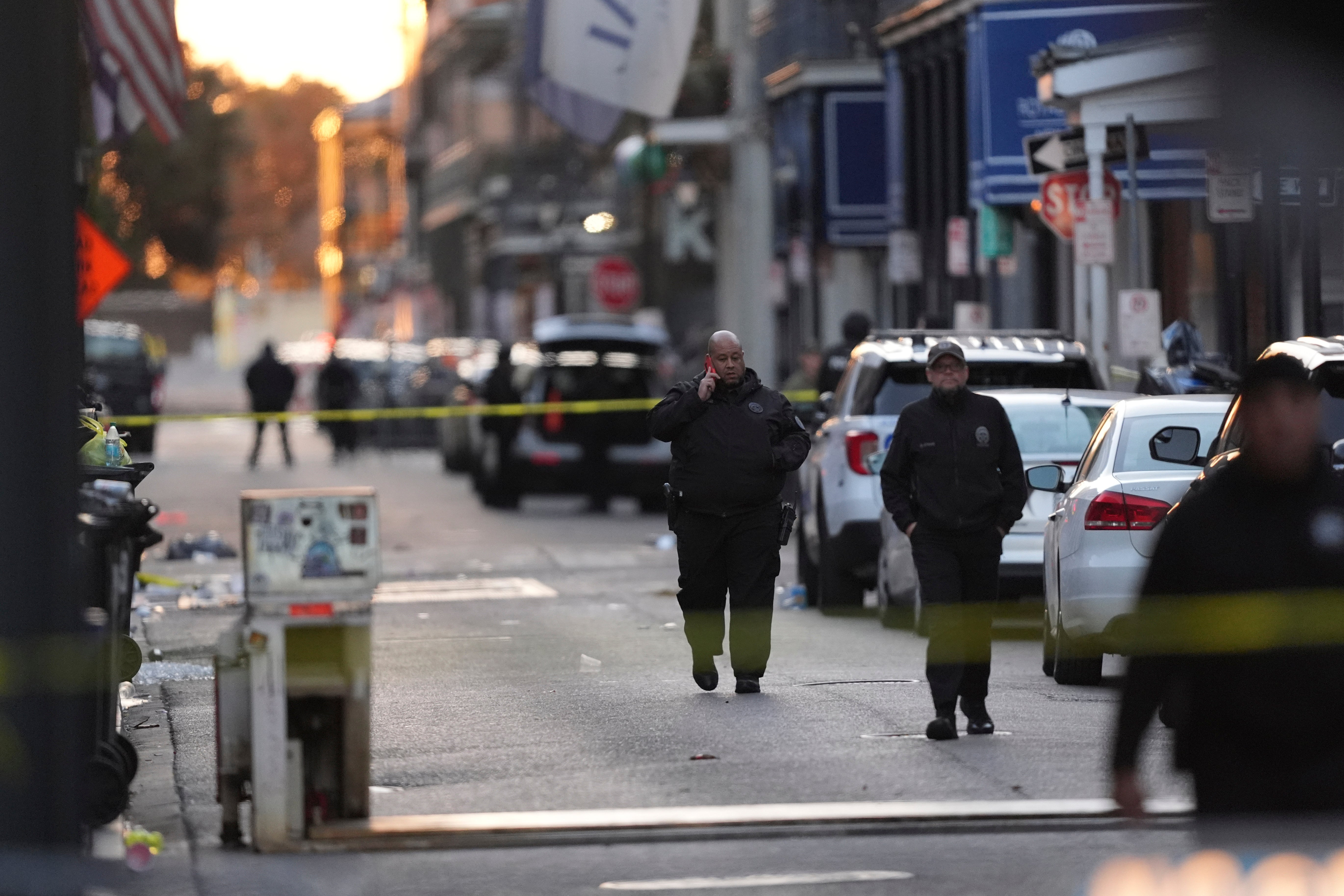 Emergency services attend the scene after a vehicle drove into a crowd on New Orleans' Canal and Bourbon Street, Wednesday Jan. 1, 2025.