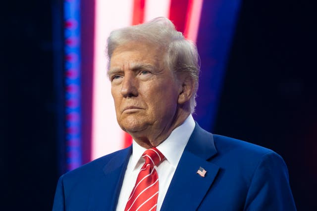 <p>President-elect Donald Trump looks on during Turning Point USA’s AmericaFest at the Phoenix Convention Center last month. Despite warning about the nation’s alleged crime surge, rates of violent crime and murder have actually dropped, data shows </p>