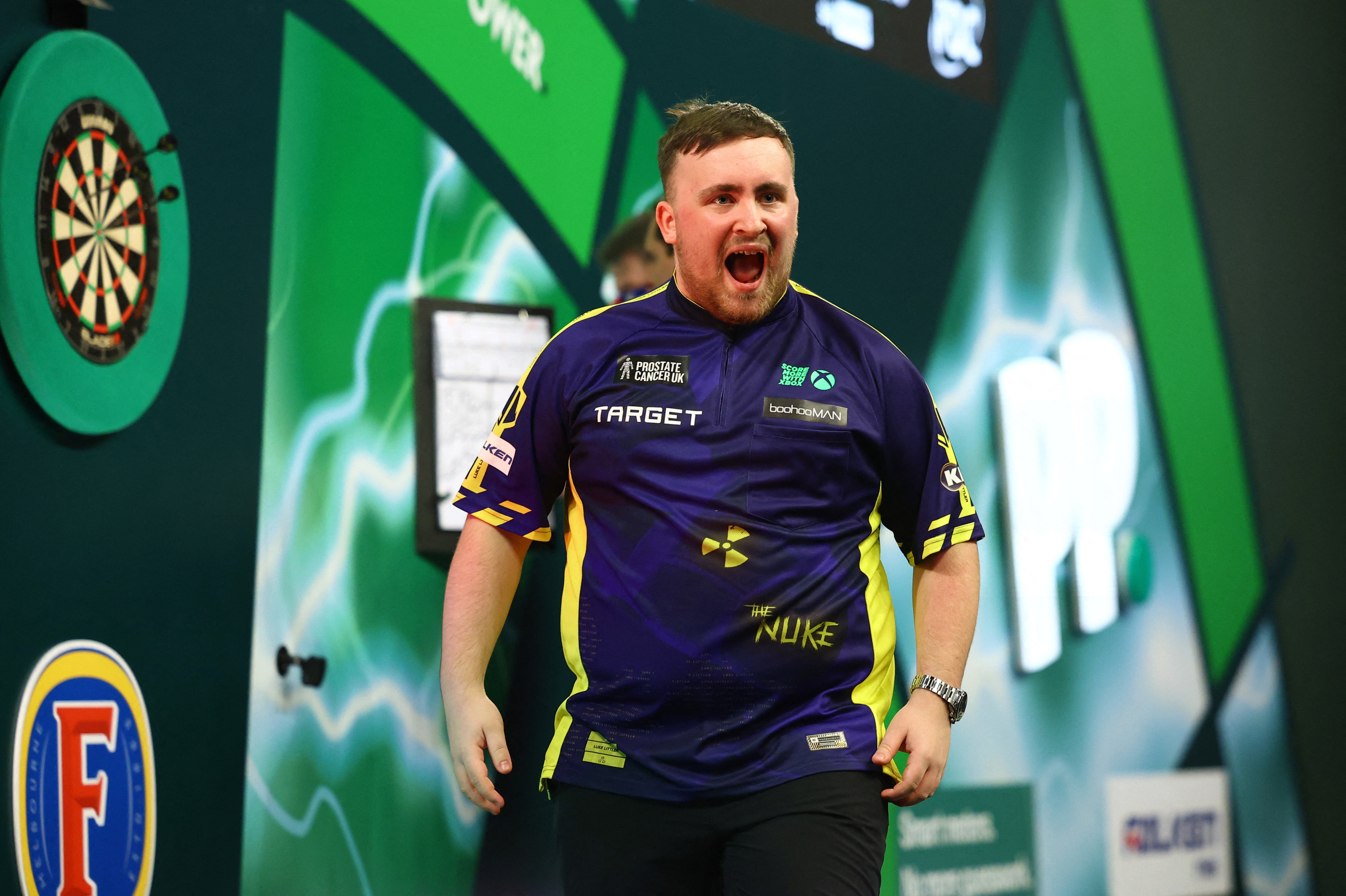 Littler celebrated a dominant semi-final win over Stephen Bunting