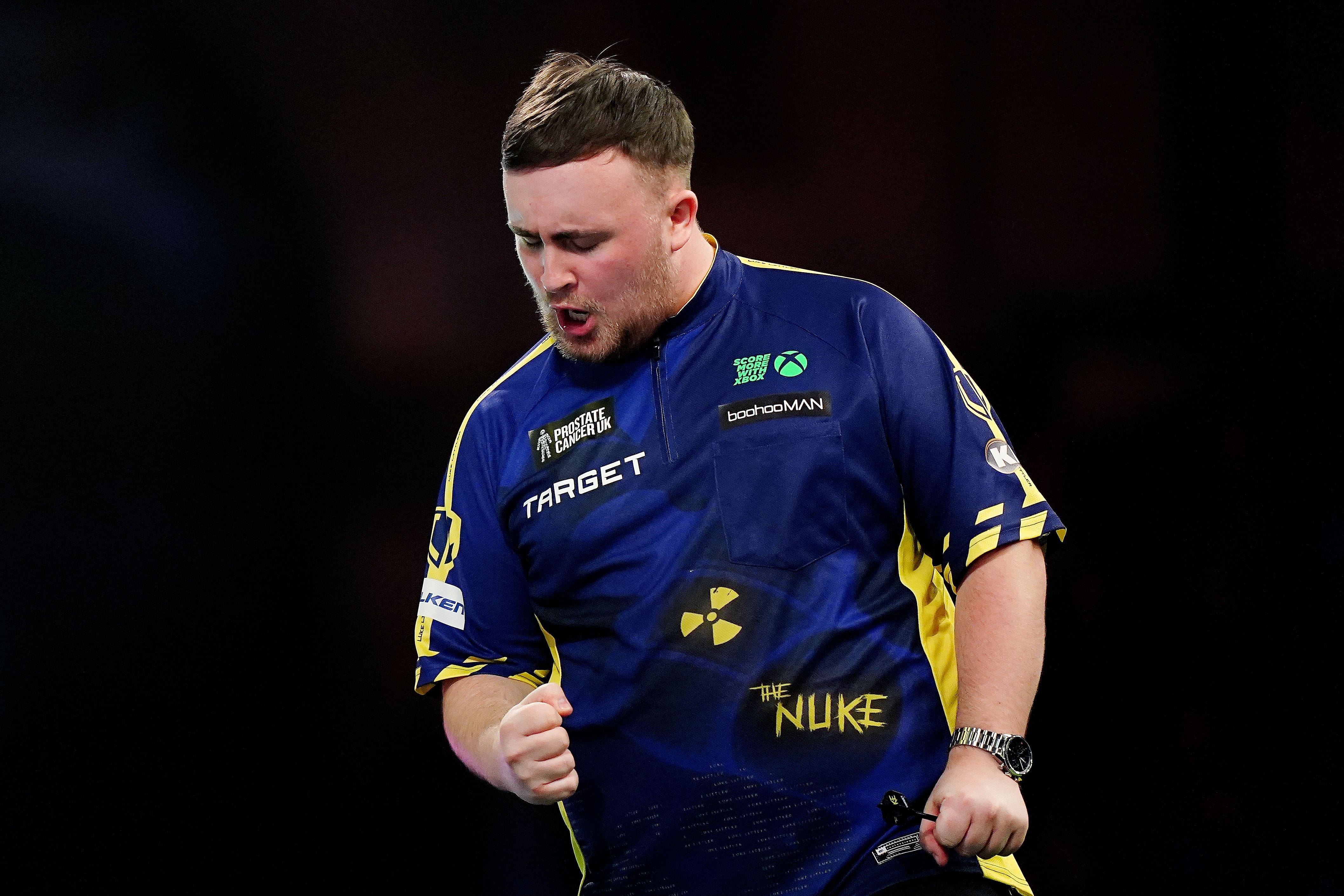 Luke Littler is back in the World Championship final after beating Stephen Bunting (Zac Goodwin/PA)