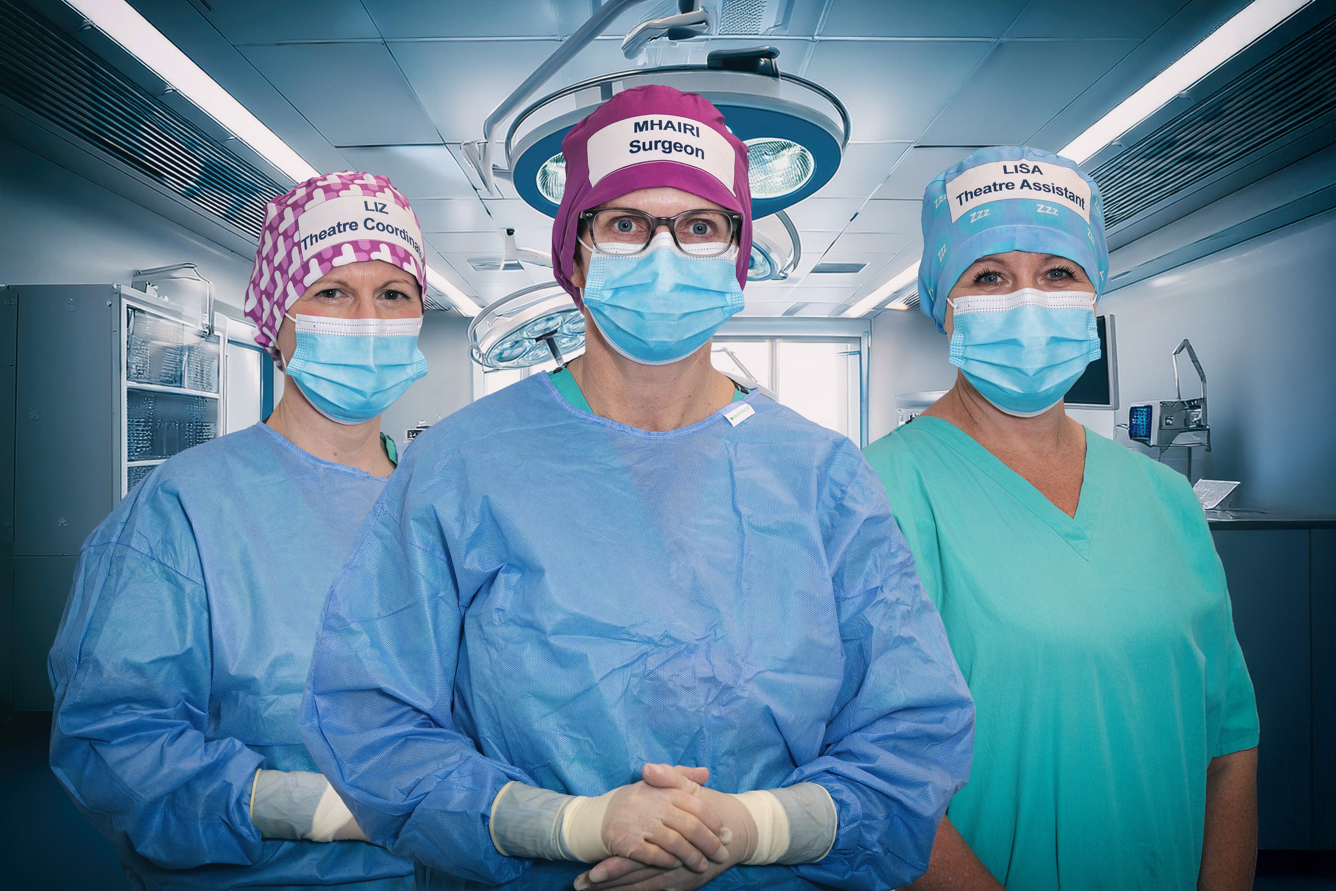 Medical staff try out the new sustainable theatre caps (Marsaili Mainz/PA)