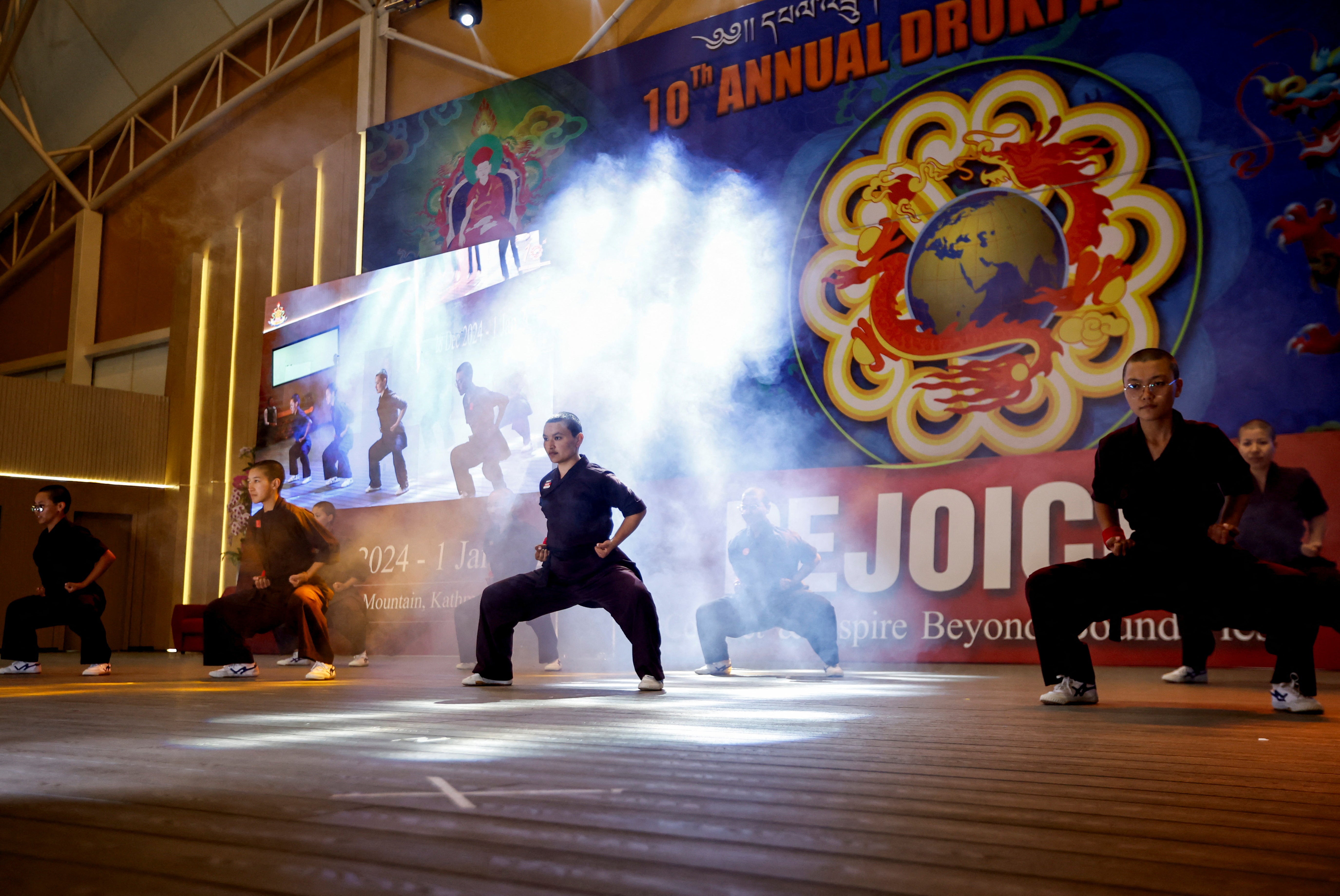 Kung Fu nuns, who practise the martial art for self-defence and meditation, demonstrate their skills during the reopening of the nunnery for the first time since the COVID-19 closure at Druk Amitabha Mountain Nunnery in Kathmandu, Nepal December 30, 2024