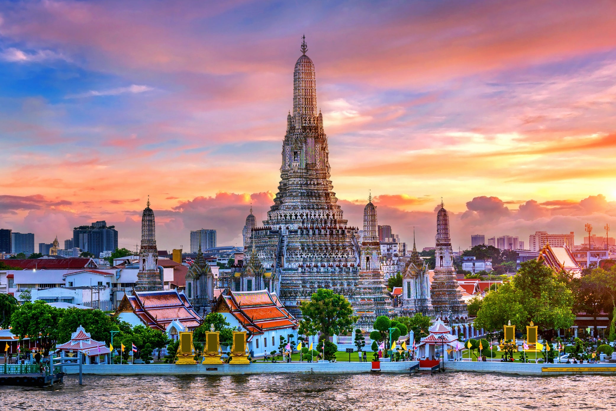 Discover the dazzling sights of Wat Arun, a temple along the Chao Phraya and more on your trip to Bangkok