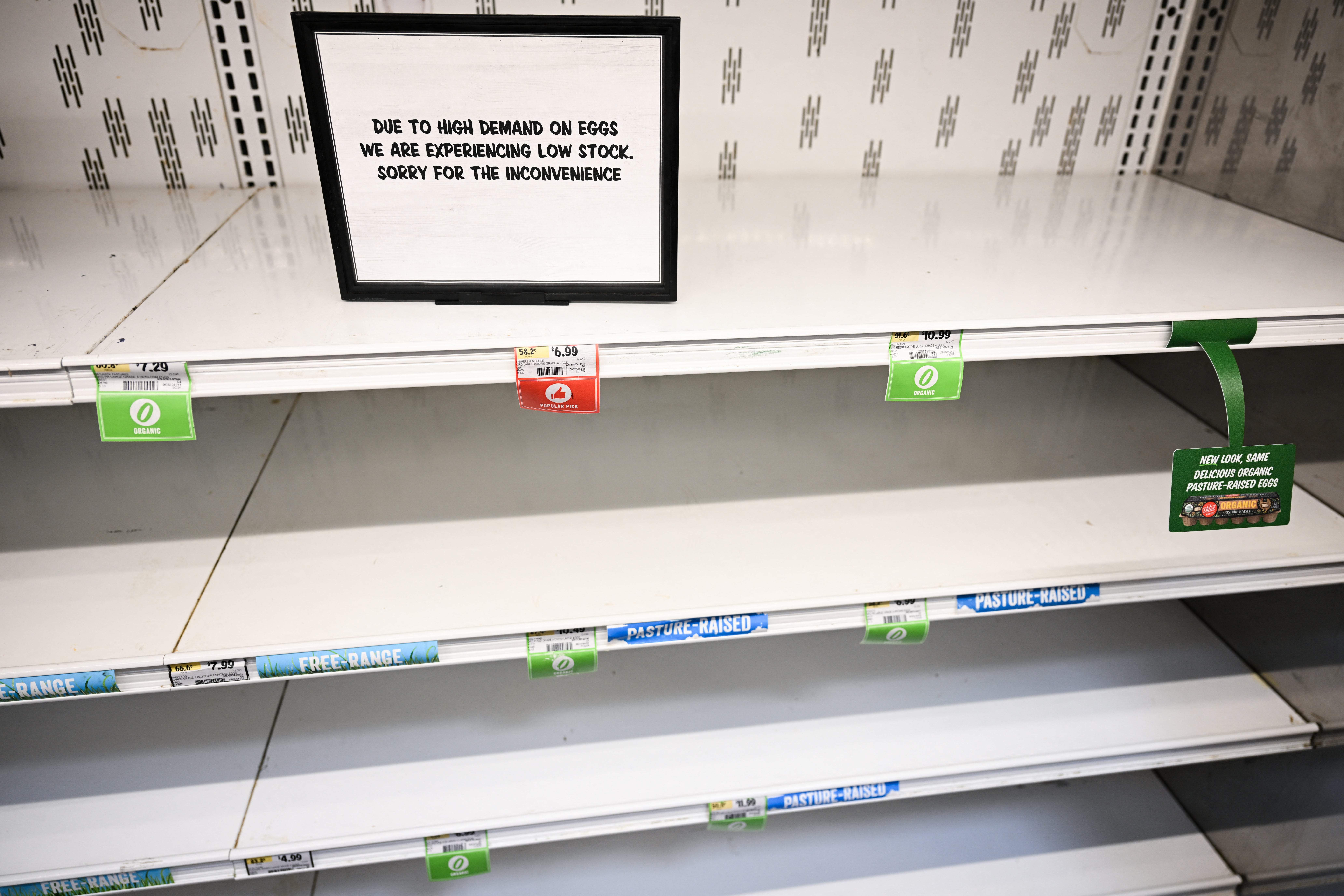 Empty shelves for eggs are seen during a shortage at a Sprouts Farmer’s Market grocery store in Redondo Beach, California, on Thursday. Bird flu has depleted the nation’s supply and sent prices skyrocketing