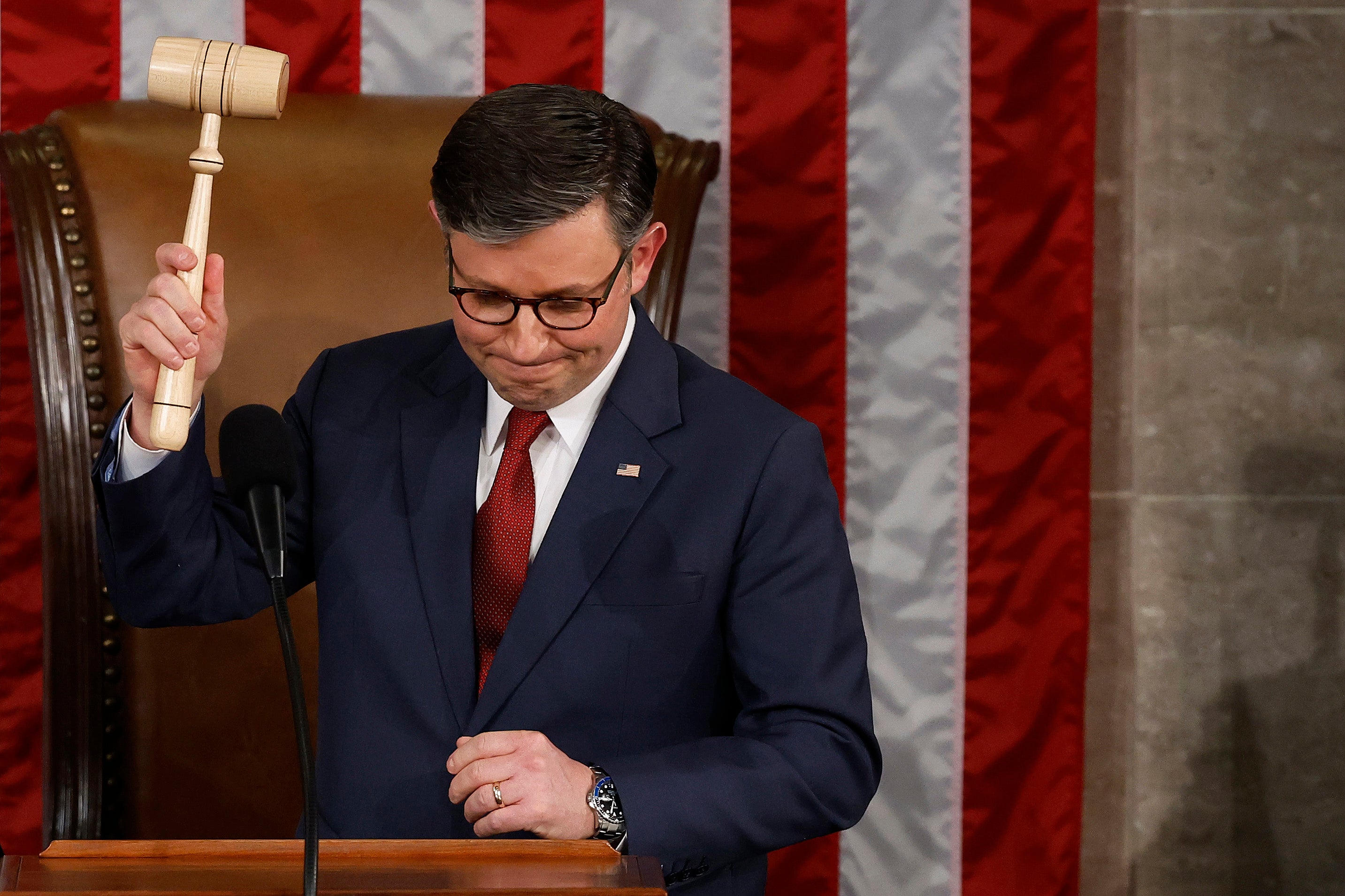 Speaker of the House Mike Johnson (R-LA) holds up the gavel after being re-elected Speaker on the first day of the 119th Congress in the House Chamber of the U.S. Capitol Building on January 3, 2025 in Washington, DC. He has committed to cut government spending and investigate the January 6 Select Committee