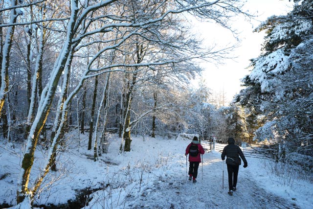 <p>Walkers in the Pentland Hills near Edinburgh on Saturday </p>