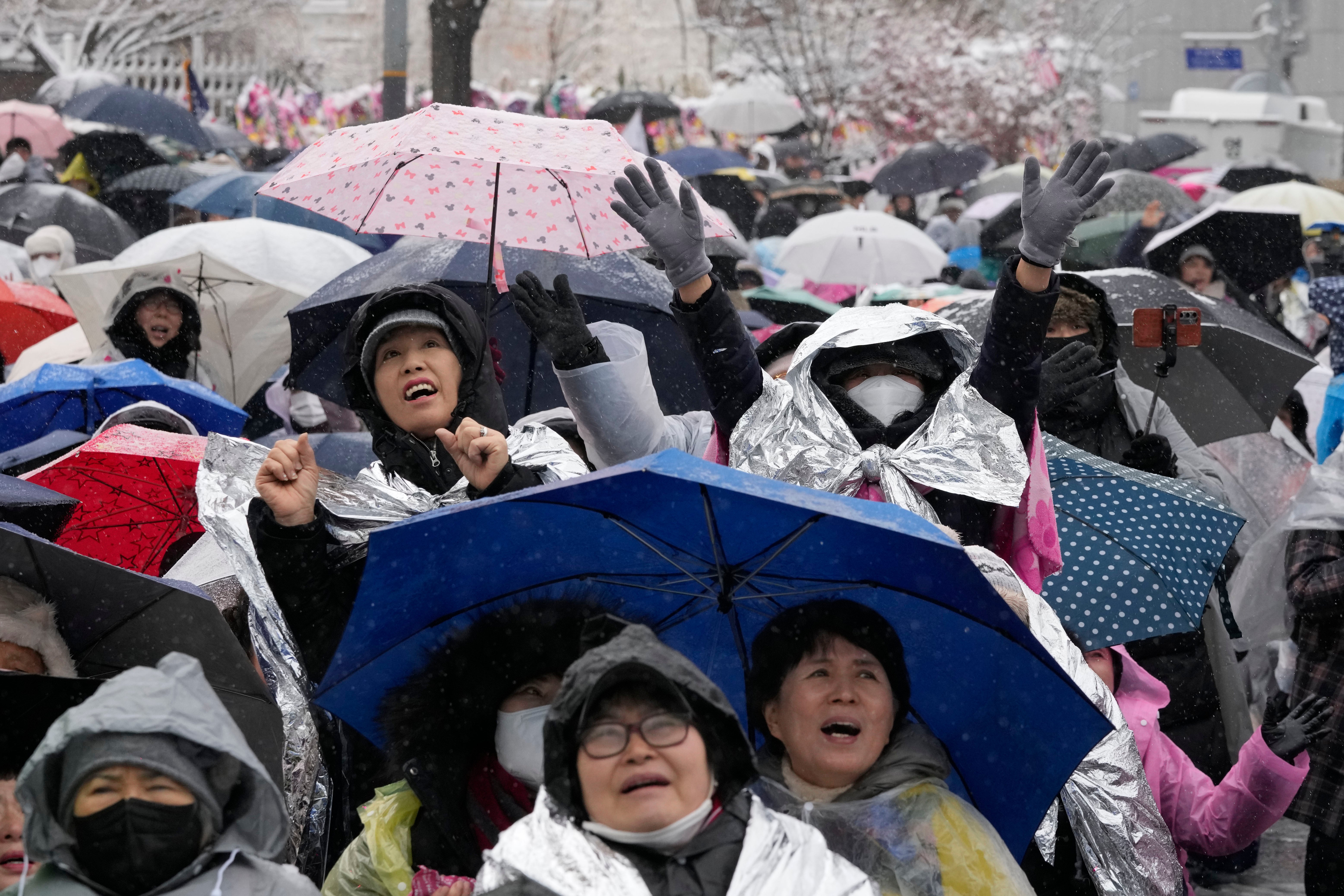 Supporters of impeached South Korean President Yoon Suk Yeol attend a Sunday service as they gather to oppose his impeachment near the presidential residence in Seoul, South Korea, Sunday, 5 Jan 2025