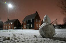 UK weather live: Airports close runways leading to flight delays as snow and freezing rain hits Britain