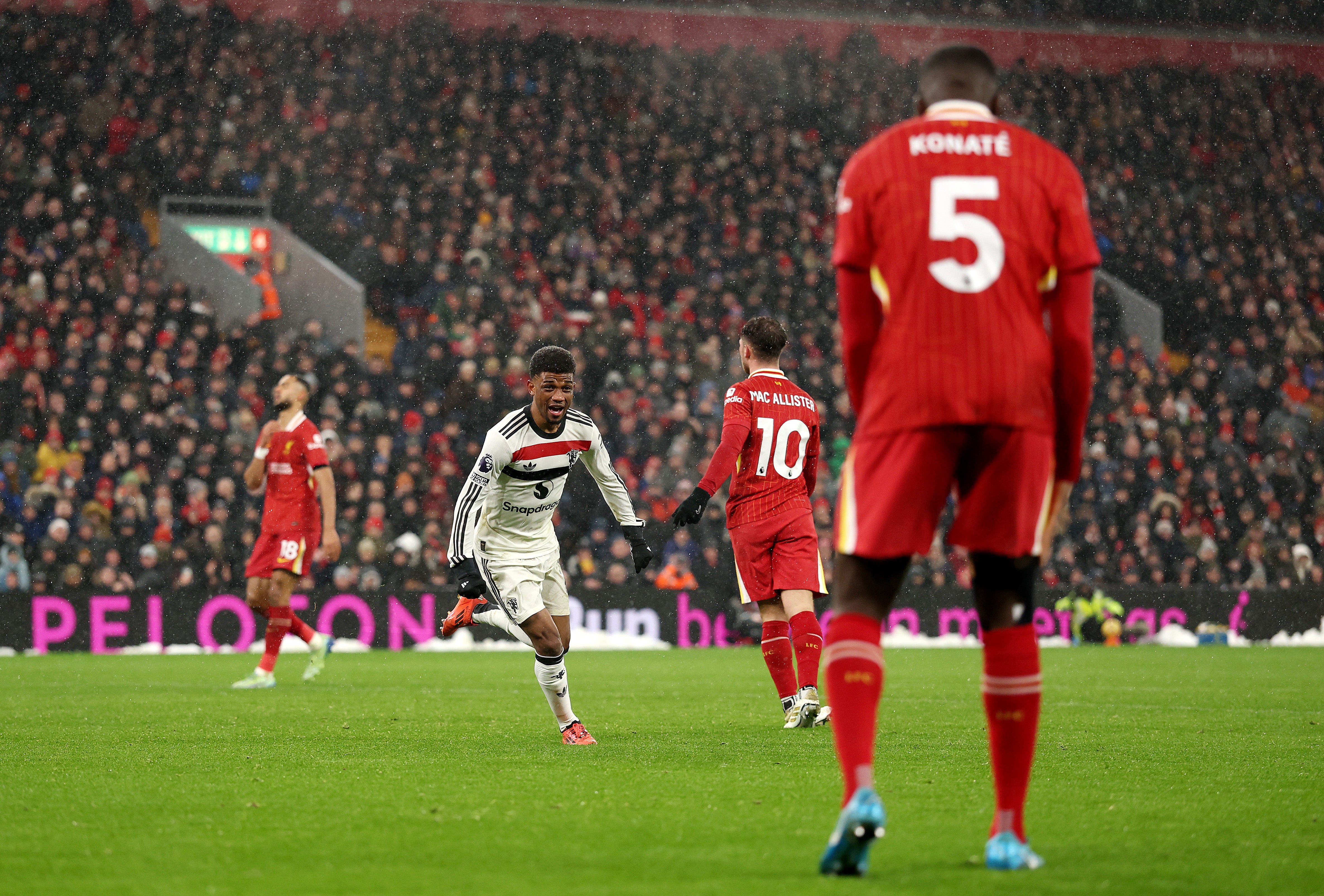 Amad Diallo celebrates after scoring Manchester United’s equaliser