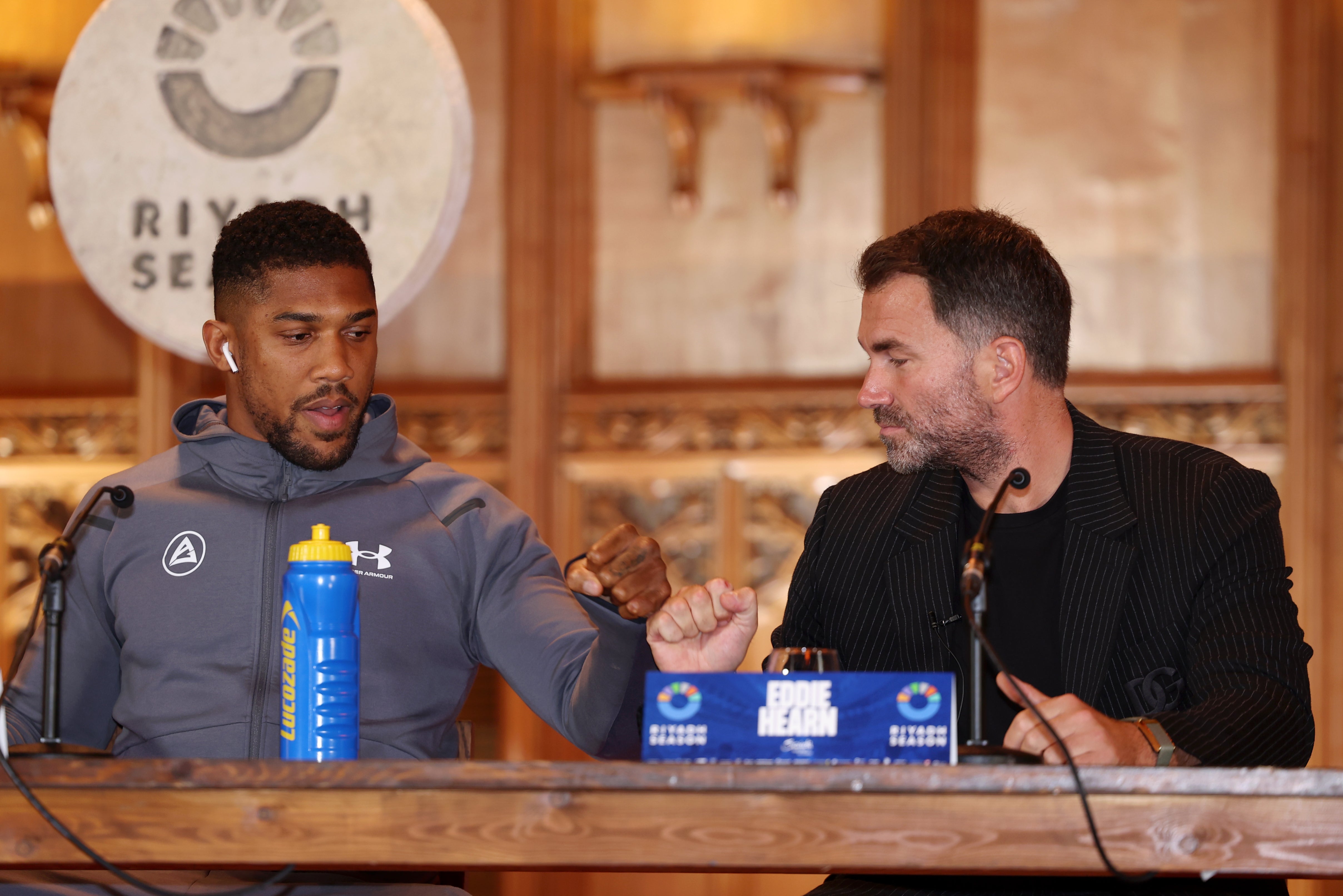 Anthony Joshua (left) with his promoter Eddie Hearn