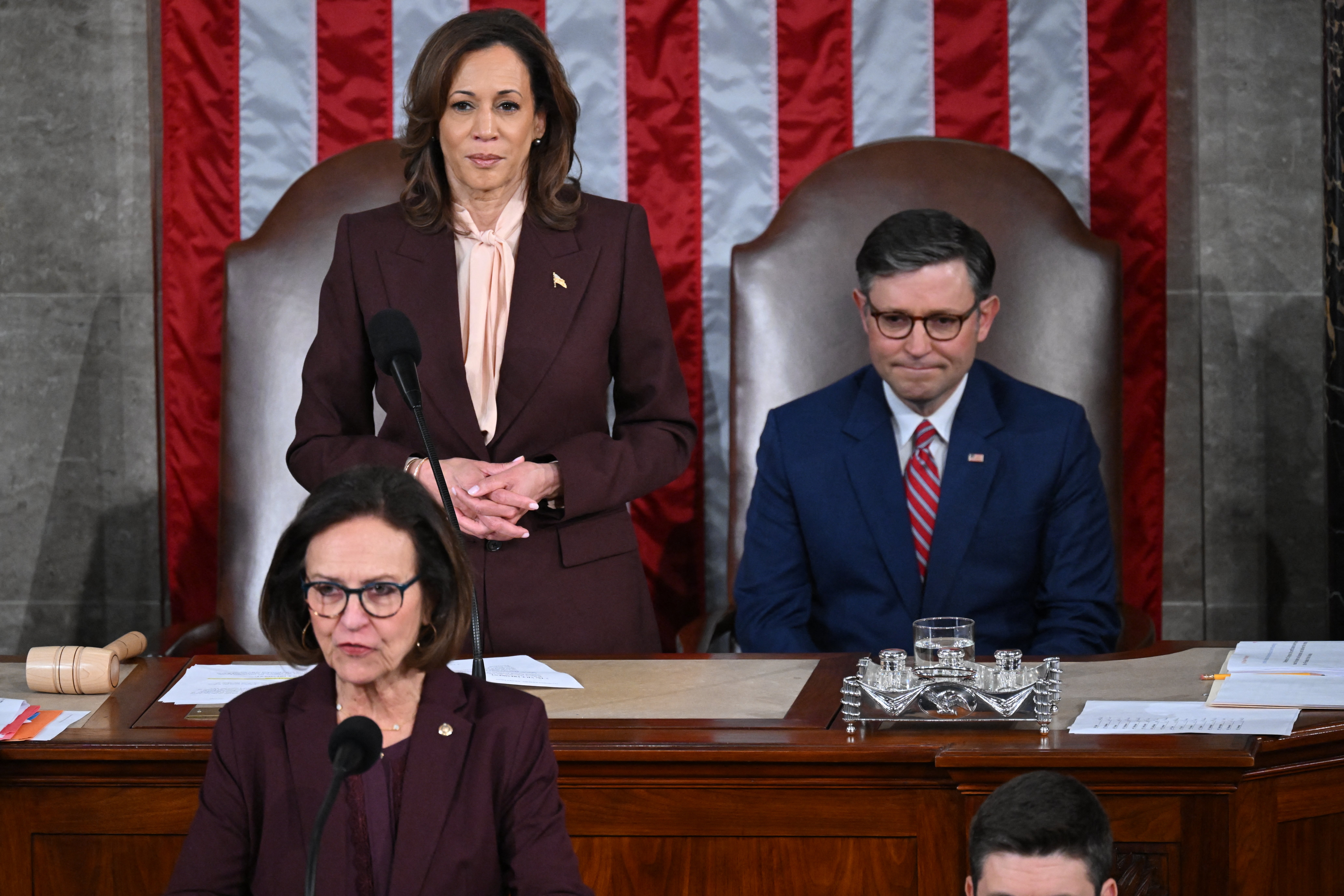 (L-R) US Senator Deb Fischer, Republican from Nebraska, speaks as US Vice President Kamala Harris and Speaker of the House Mike Johnson look on during of a joint session of Congress to certify the results of the 2024 Presidential election