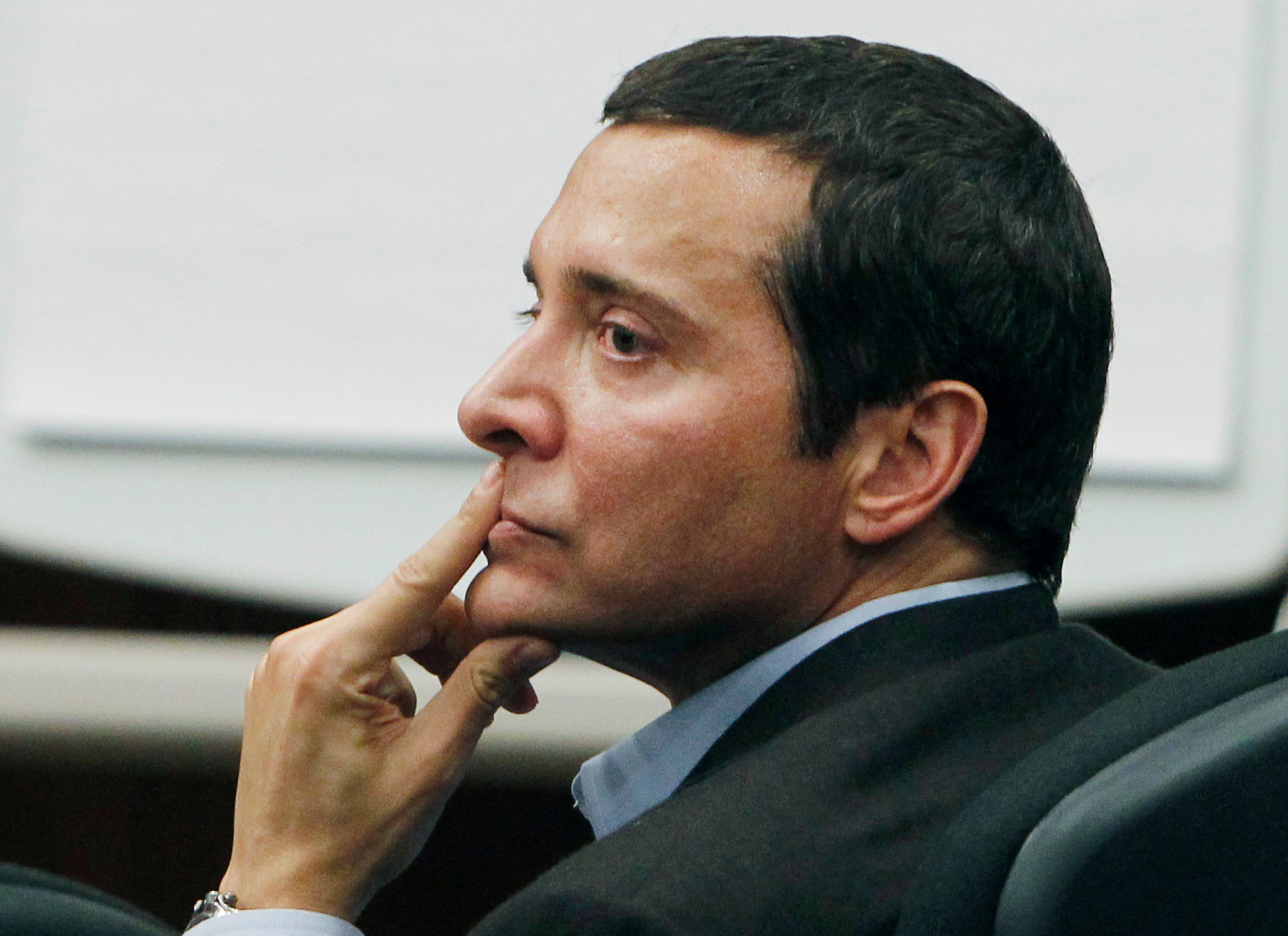 James Arthur Ray listens to prosecuting attorneys speak during his criminal trial,