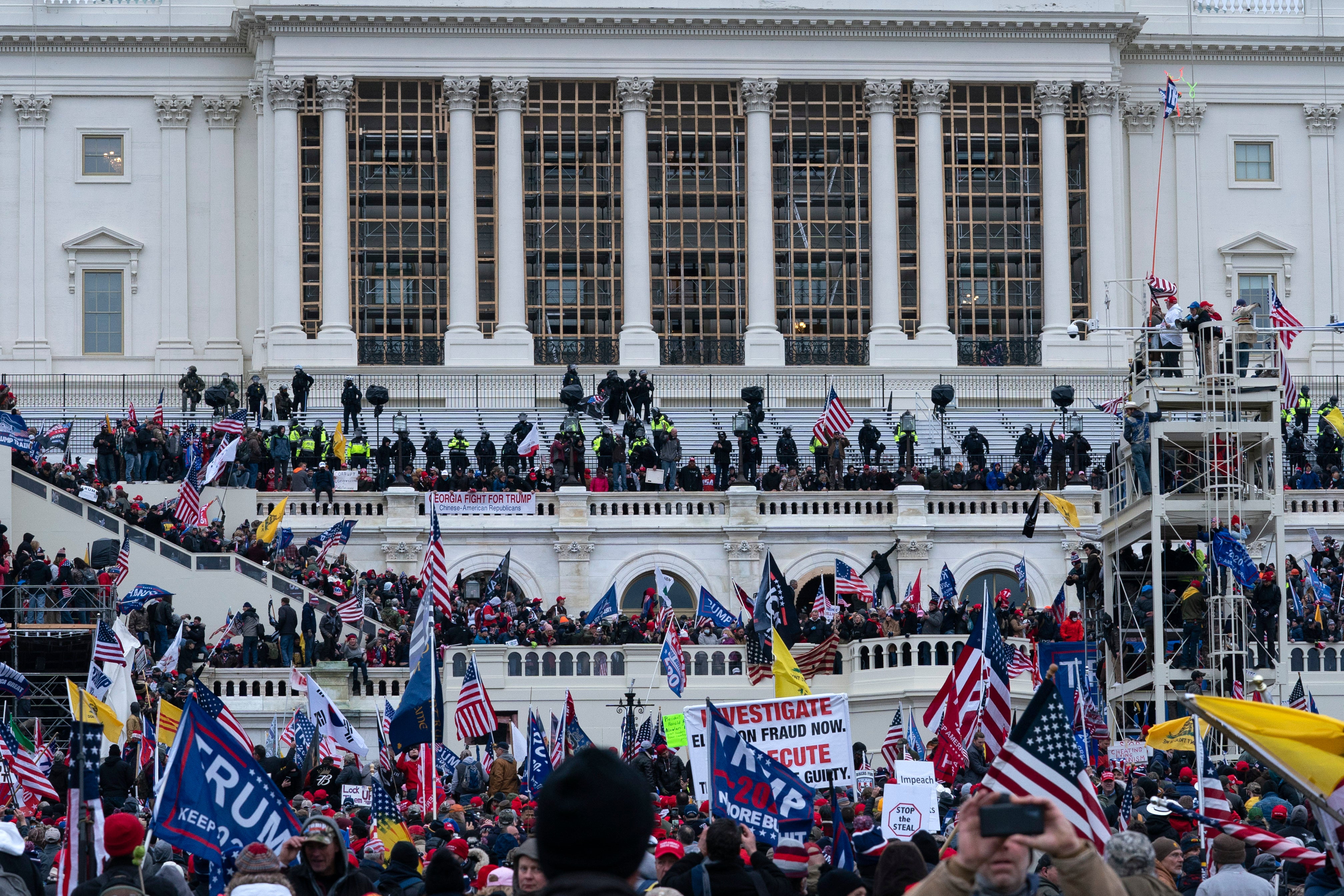 Supporters of President Donald Trump rally outside the U.S. Capitol on Wednesday, Jan. 6, 2021, in Washington