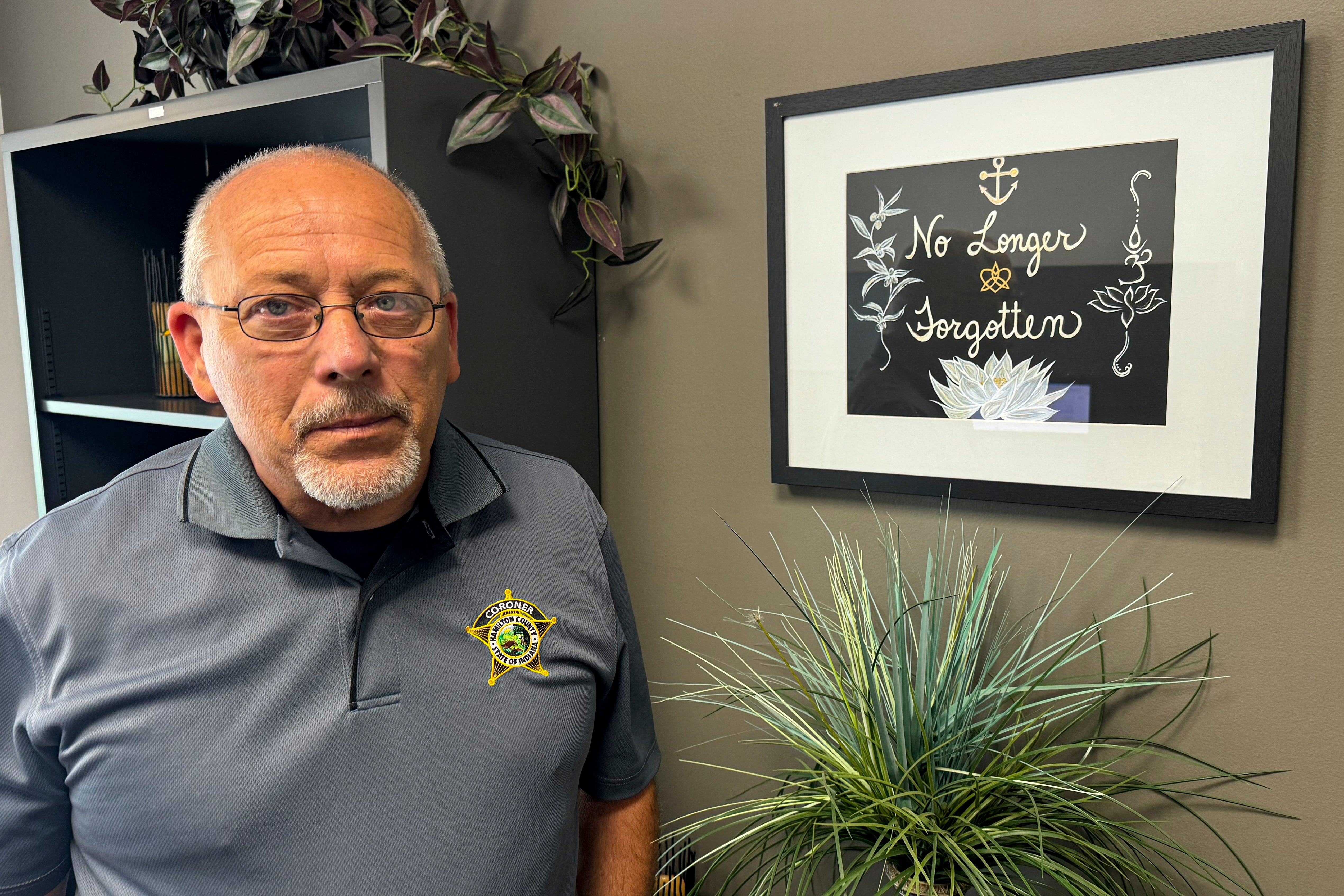 Hamilton County Coroner Jeff Jellison stands in his office in Noblesville, Indiana, July 11